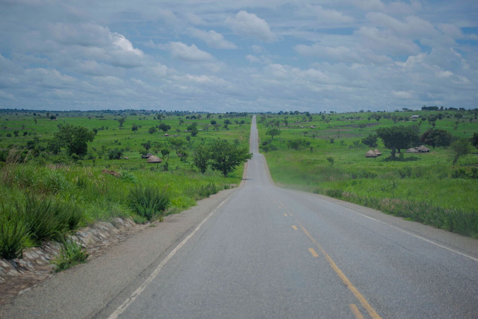 Canon EF 75-300mm f/4-5.6 sample photo. Clouds, countryside, road, green photography