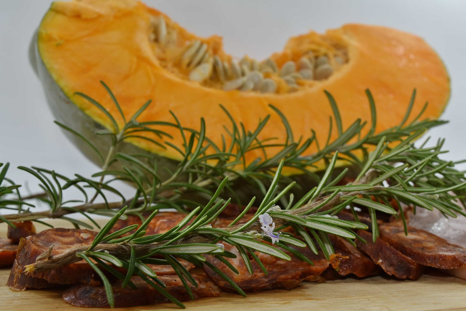 Nikon D5500 sample photo. Branches, rosemary, sausage, spice photography