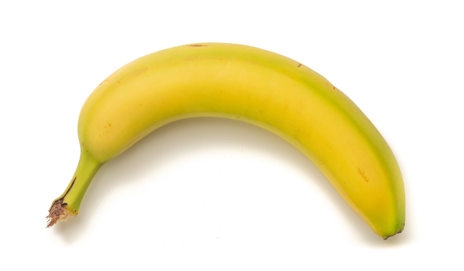Sony a7 sample photo. Banana, white background, yellow photography