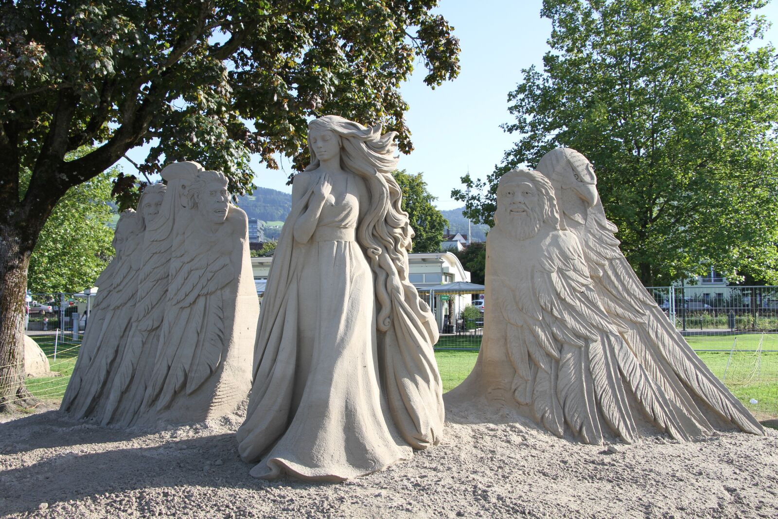 Canon EOS 7D + Canon EF-S 18-135mm F3.5-5.6 IS STM sample photo. Sand sculptures, festival, statue photography
