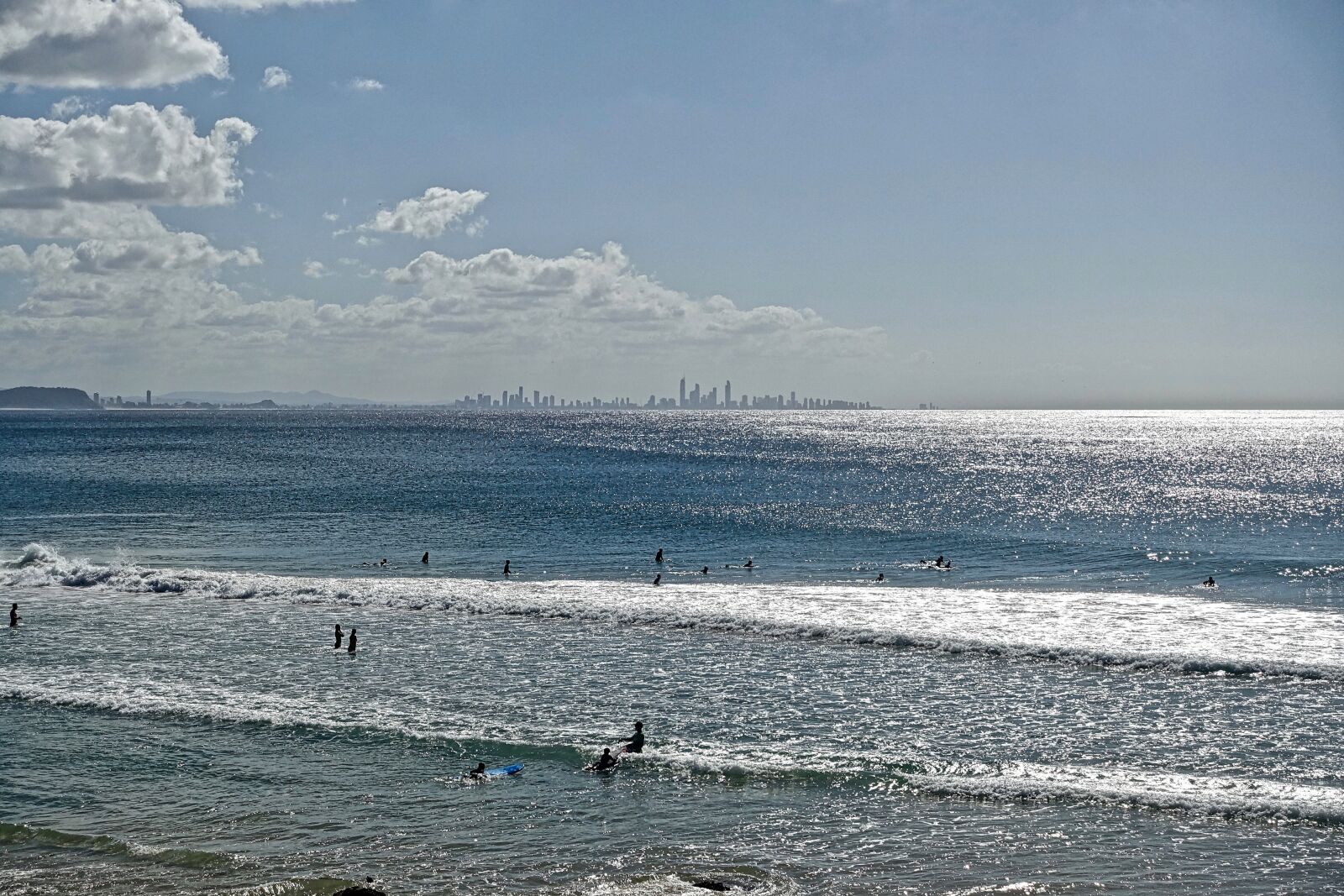 Sony Cyber-shot DSC-RX100 III sample photo. Surf, sunlight, city photography