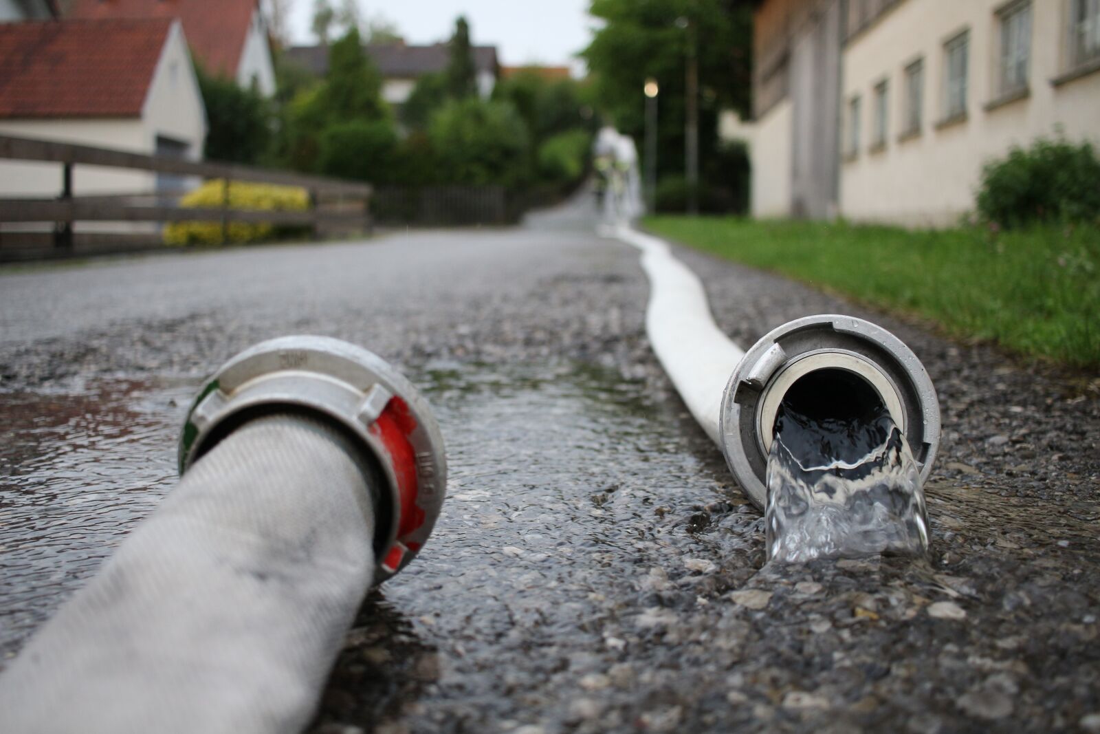 Canon EF-S 24mm F2.8 STM sample photo. Fire, hose, water photography