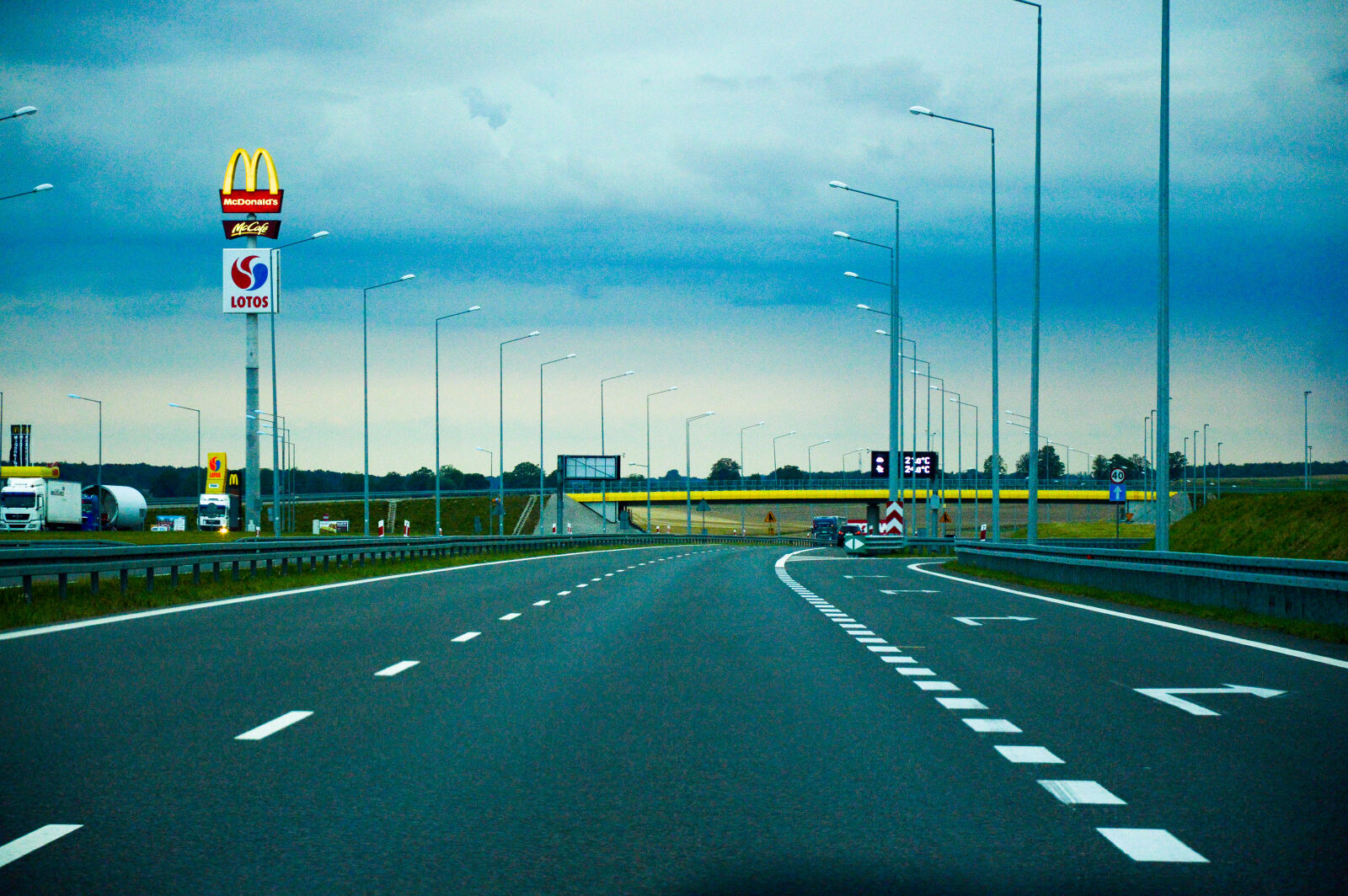 Nikon D3200 sample photo. Asphalt, drive, expressway, mcdonalds photography
