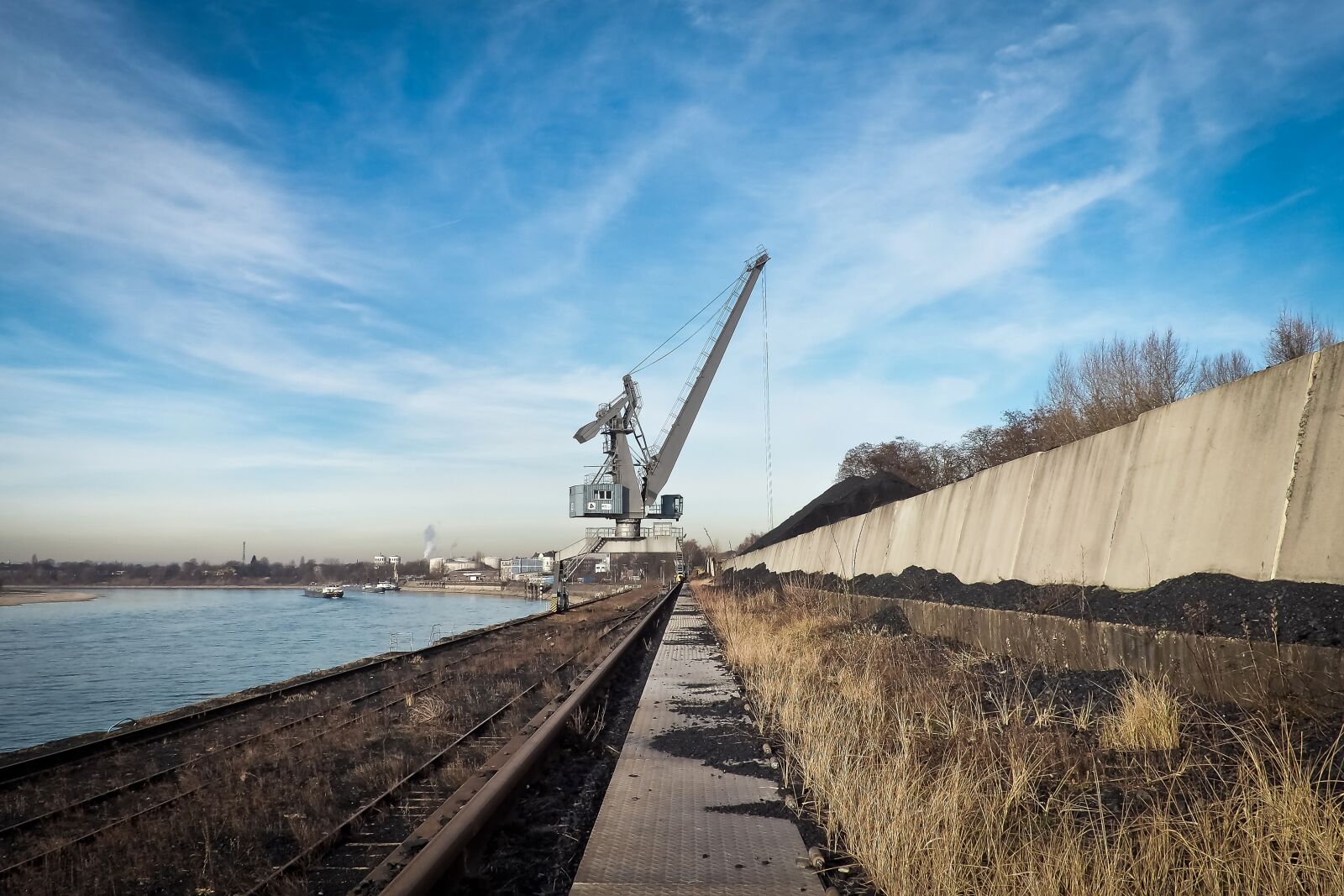 Olympus OM-D E-M10 sample photo. Port, crane, harbour crane photography