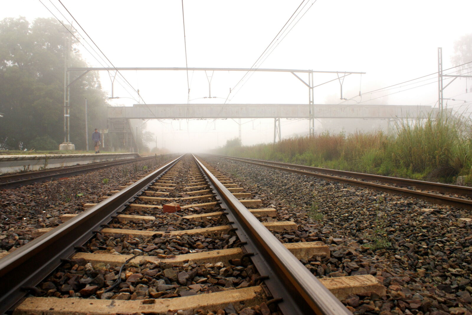 Sony Alpha DSLR-A100 sample photo. Early, morning, mist, railroad photography