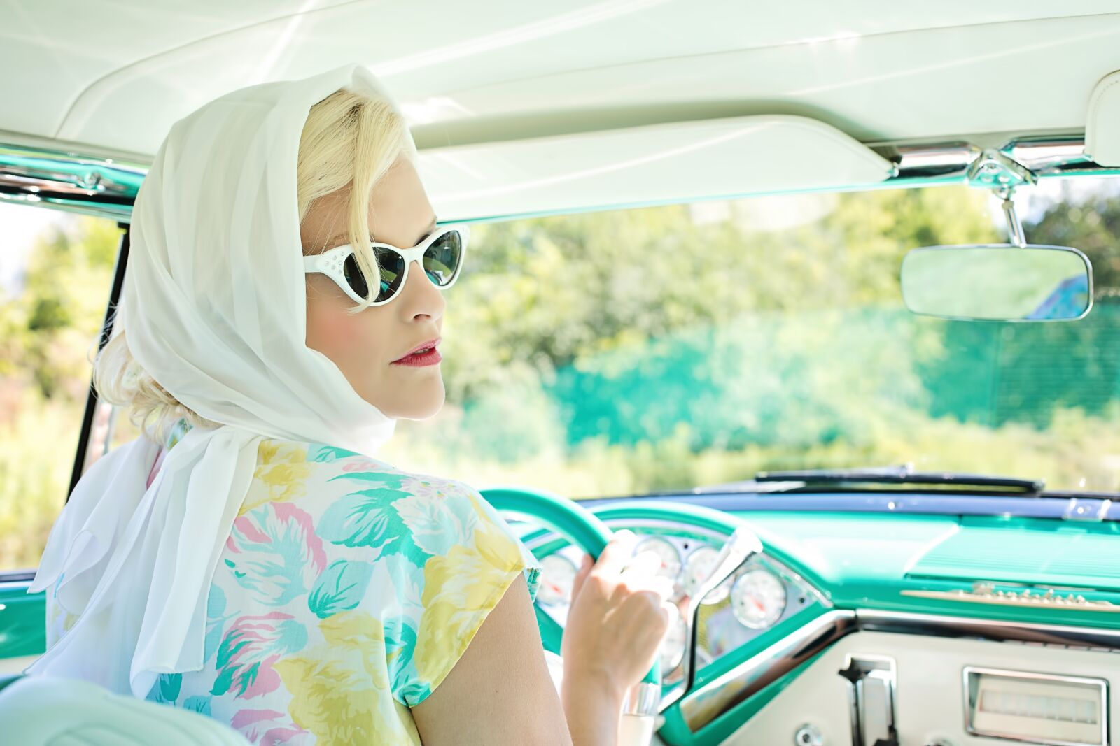 Canon EF 50mm F1.4 USM sample photo. Woman, driving, vintage, car photography