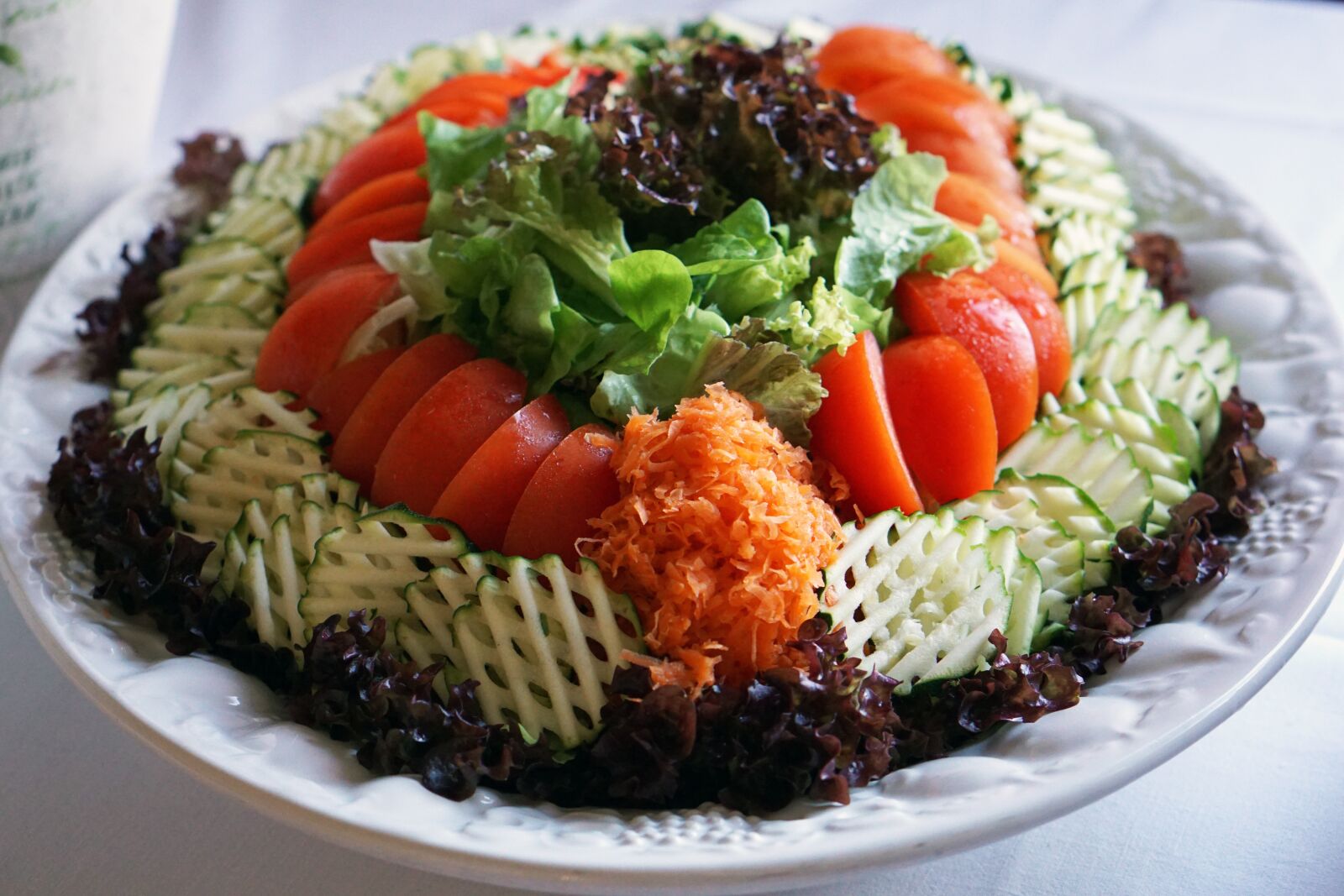 E 50mm F1.8 OSS sample photo. Salad, tomatoes, zucchini photography