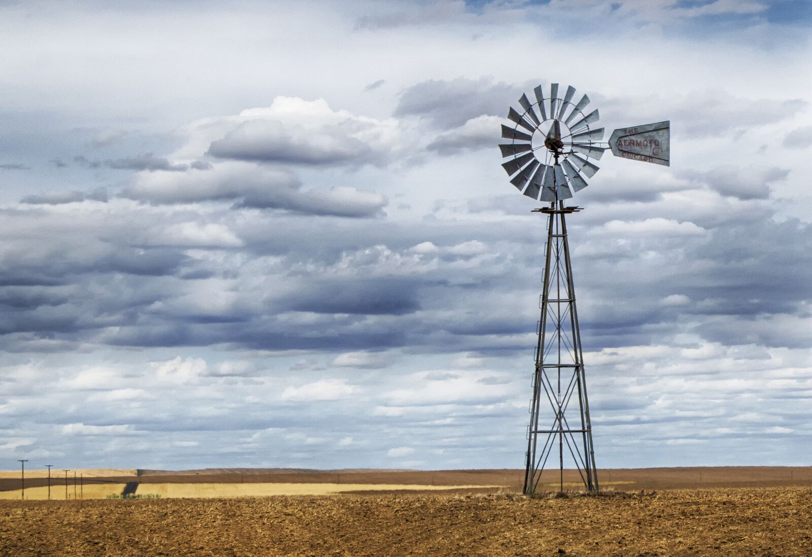 Nikon D5100 sample photo. Windmill, water pump, wind photography
