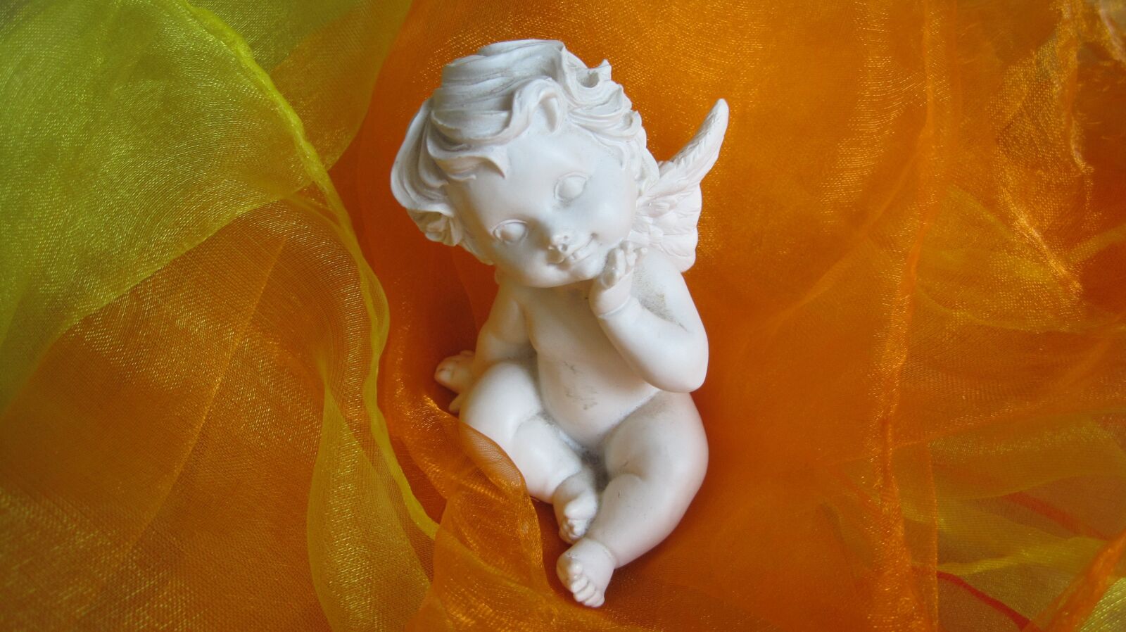 Canon PowerShot SD1200 IS (Digital IXUS 95 IS / IXY Digital 110 IS) sample photo. Angel, guardian angel, white photography