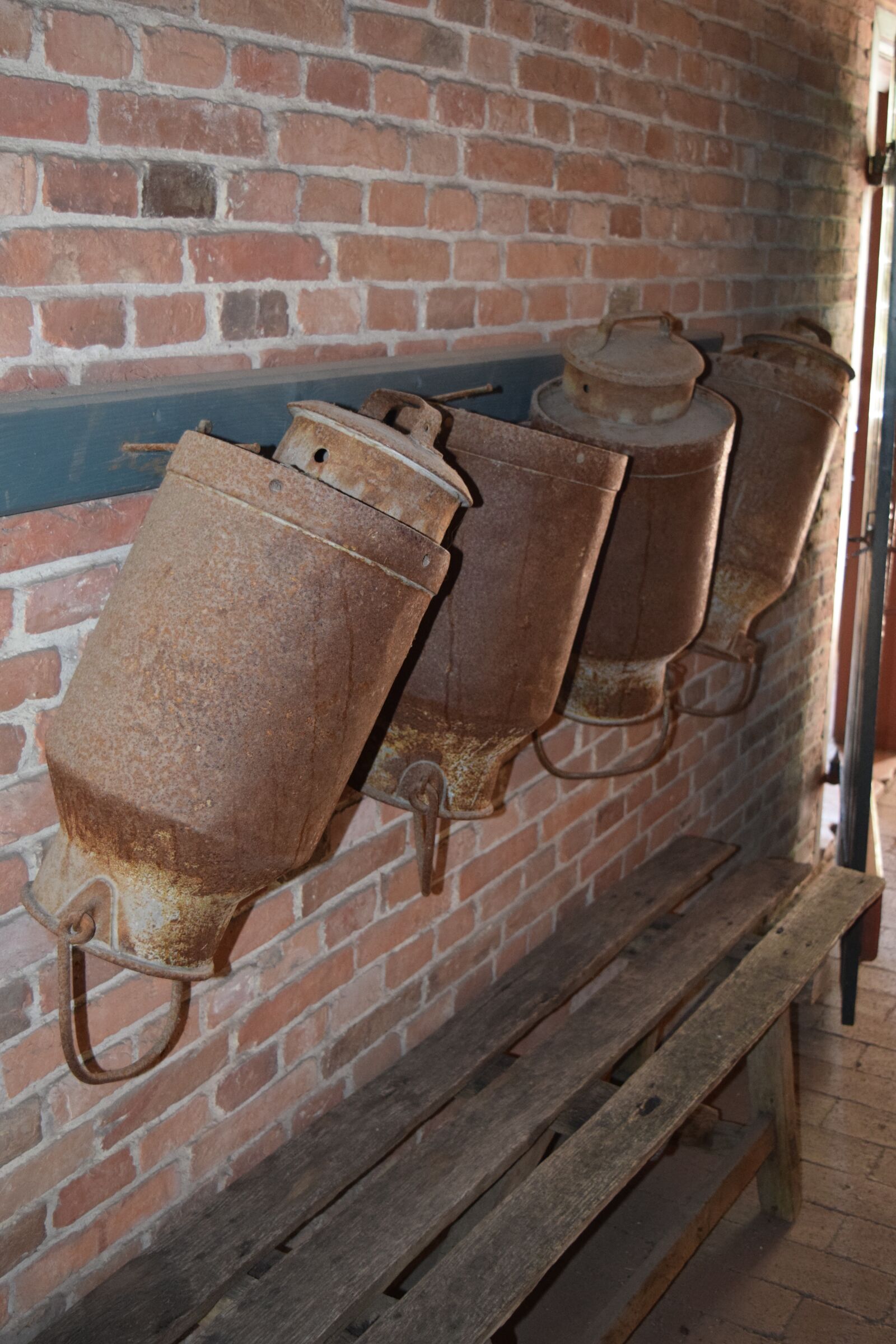 Nikon D3300 sample photo. Milk cans, farm, brick photography