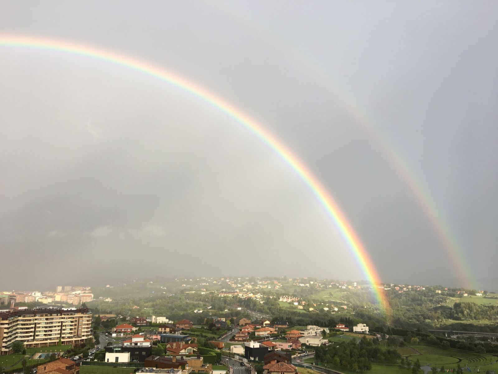 iPhone 6s Plus back camera 4.15mm f/2.2 sample photo. Double rainbow, storm, montecerrao photography