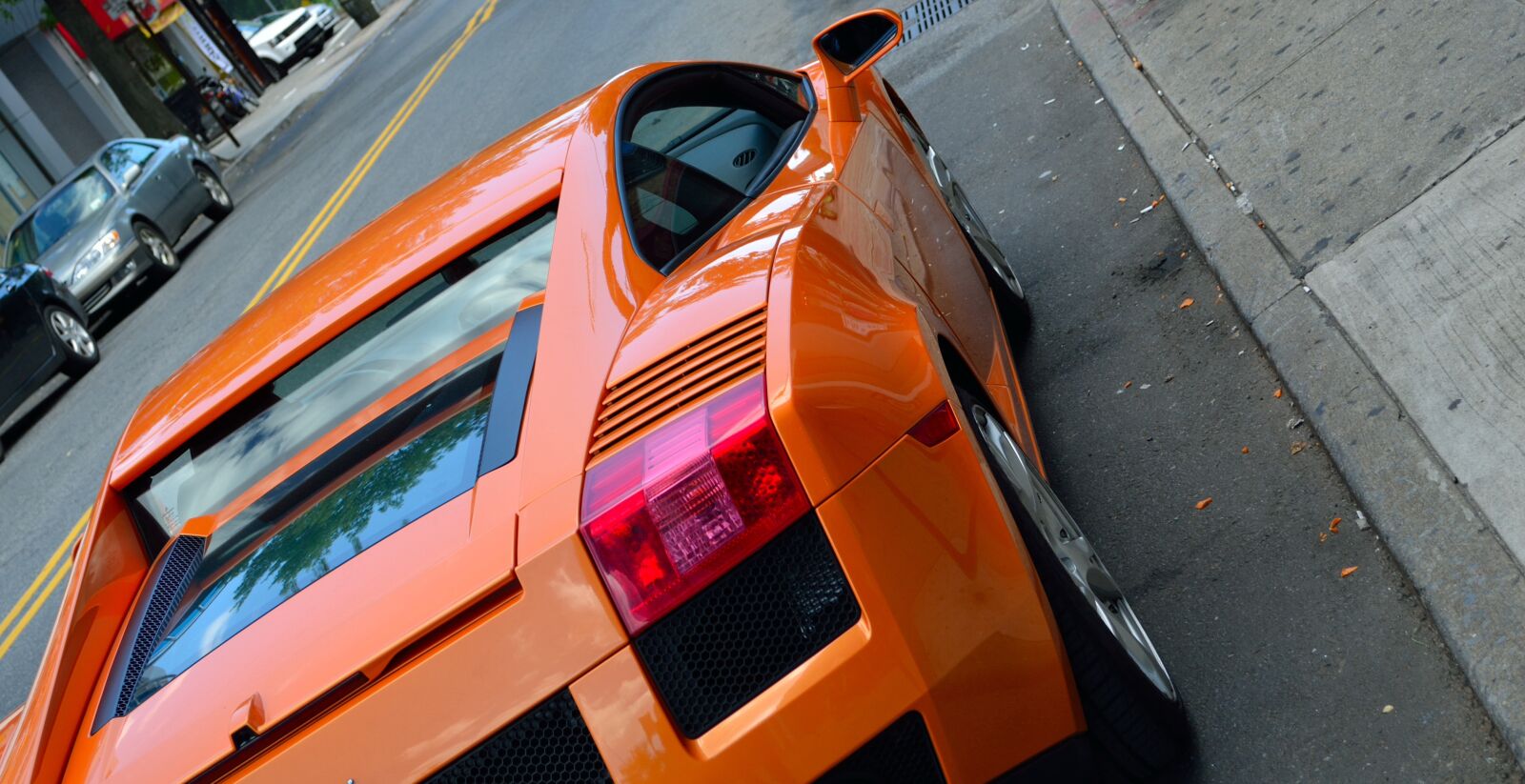 Nikon D3100 sample photo. Lamborghini, rear view, street photography
