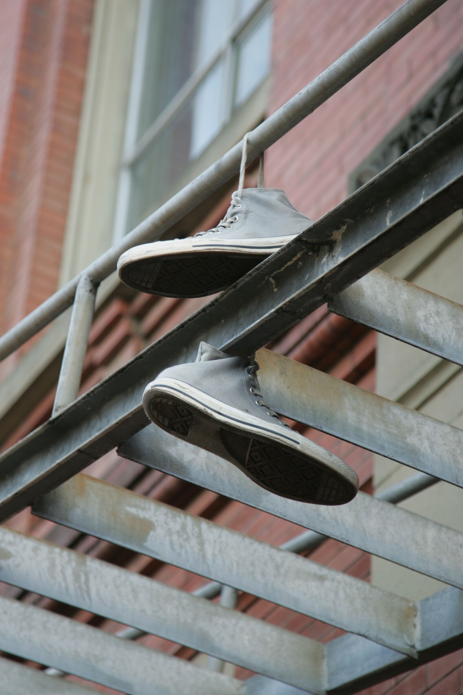 Canon EOS-1D Mark II sample photo. Sneakers, hanging, hang photography