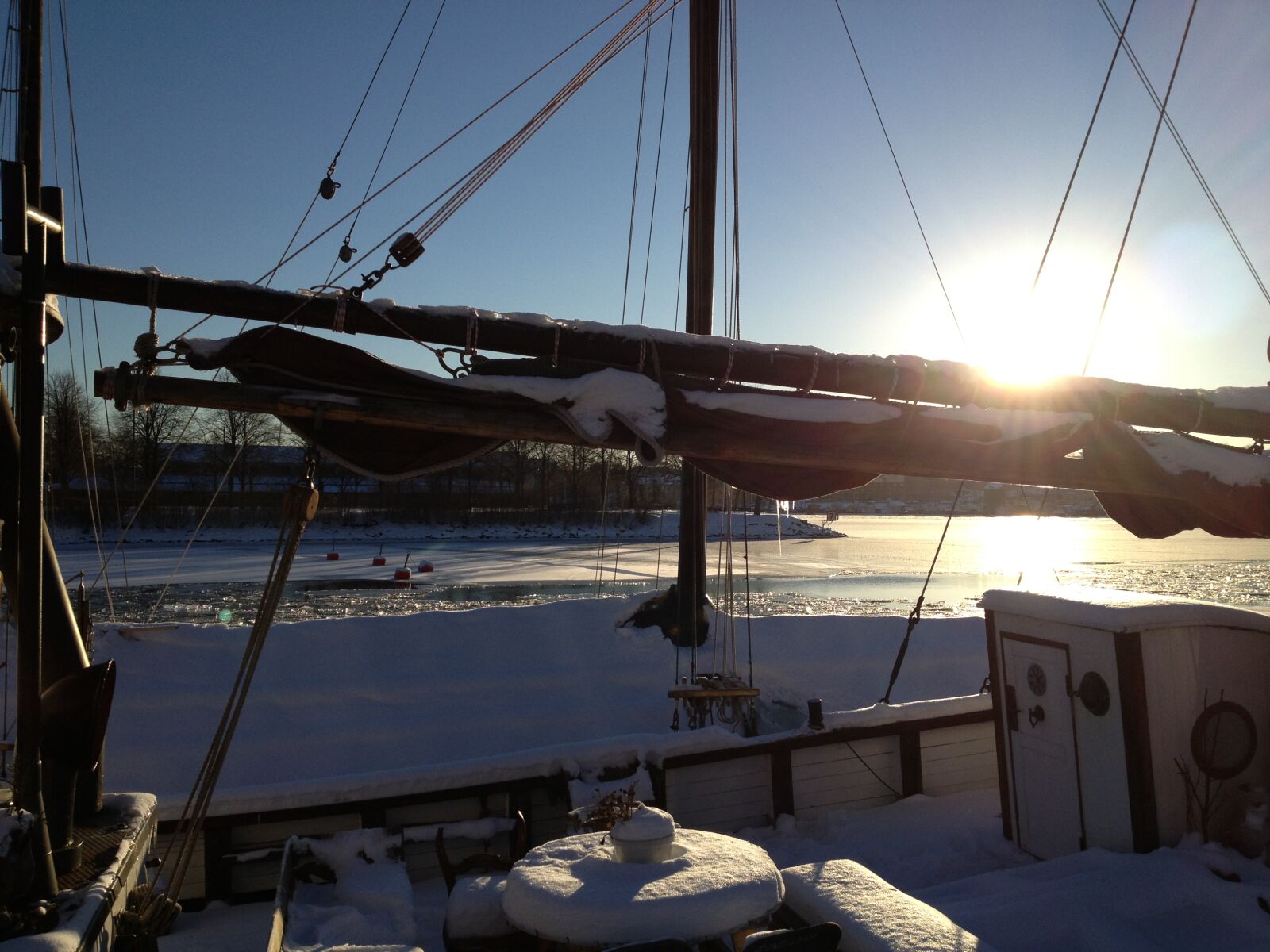 Apple iPhone 4S sample photo. Boat, ice, sun, winter photography