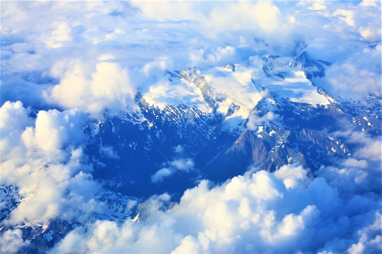 Canon EF 24-105mm F4L IS USM sample photo. Clouds, sky, mountains photography
