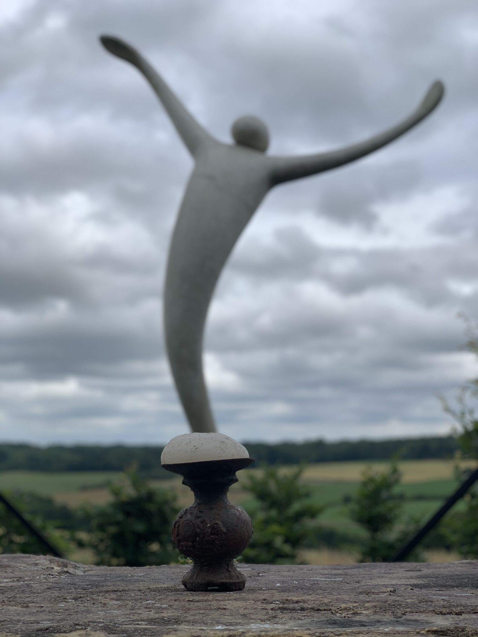 Apple iPhone XS + iPhone XS back dual camera 6mm f/2.4 sample photo. Movement, statue, sculpture photography