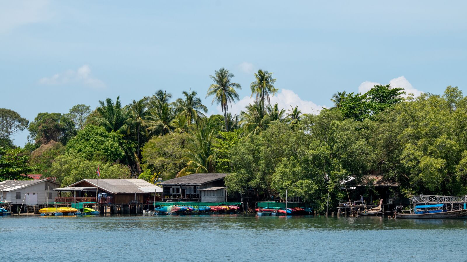 Nikon D5600 sample photo. Village, trees, rocks photography