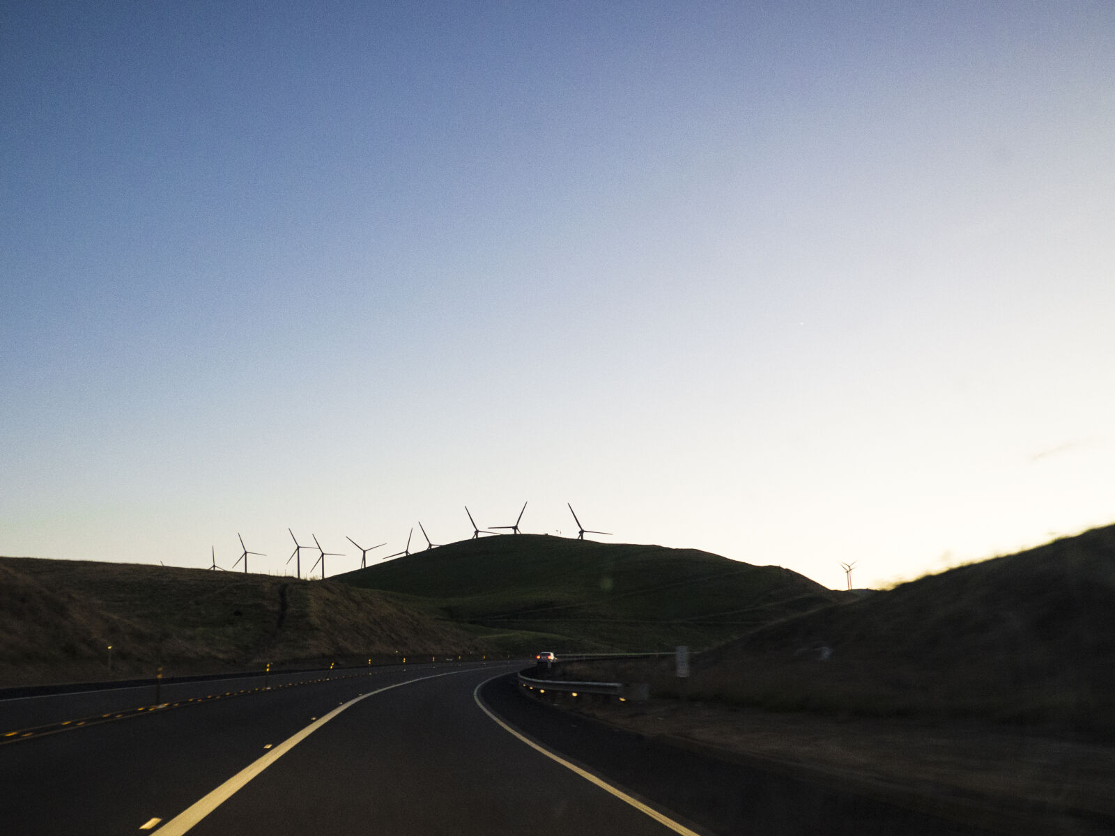 Olympus OM-D E-M10 II sample photo. Blue, dawn, highway, hills photography