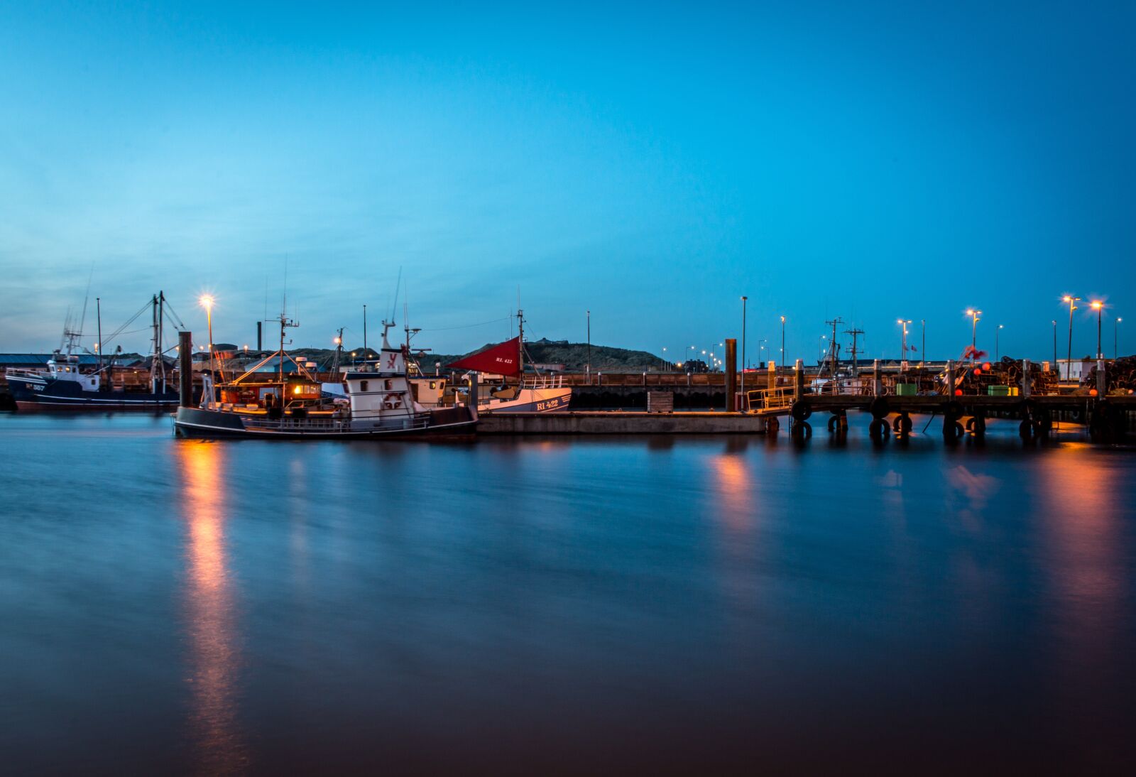 Canon EF-S 24mm F2.8 STM sample photo. Harbour, fishing boat, water photography