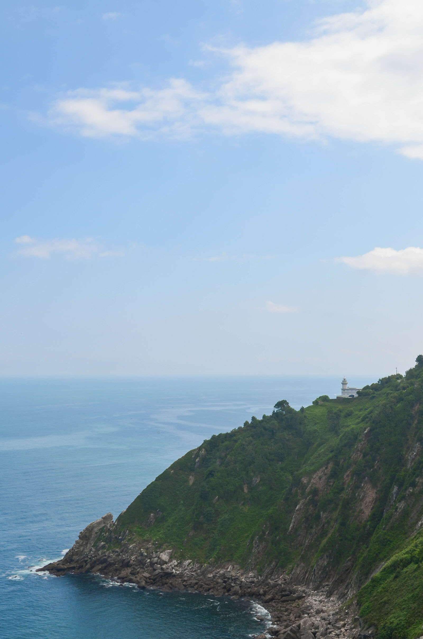 Nikon D5100 sample photo. Coat, hill, ocean, sea photography