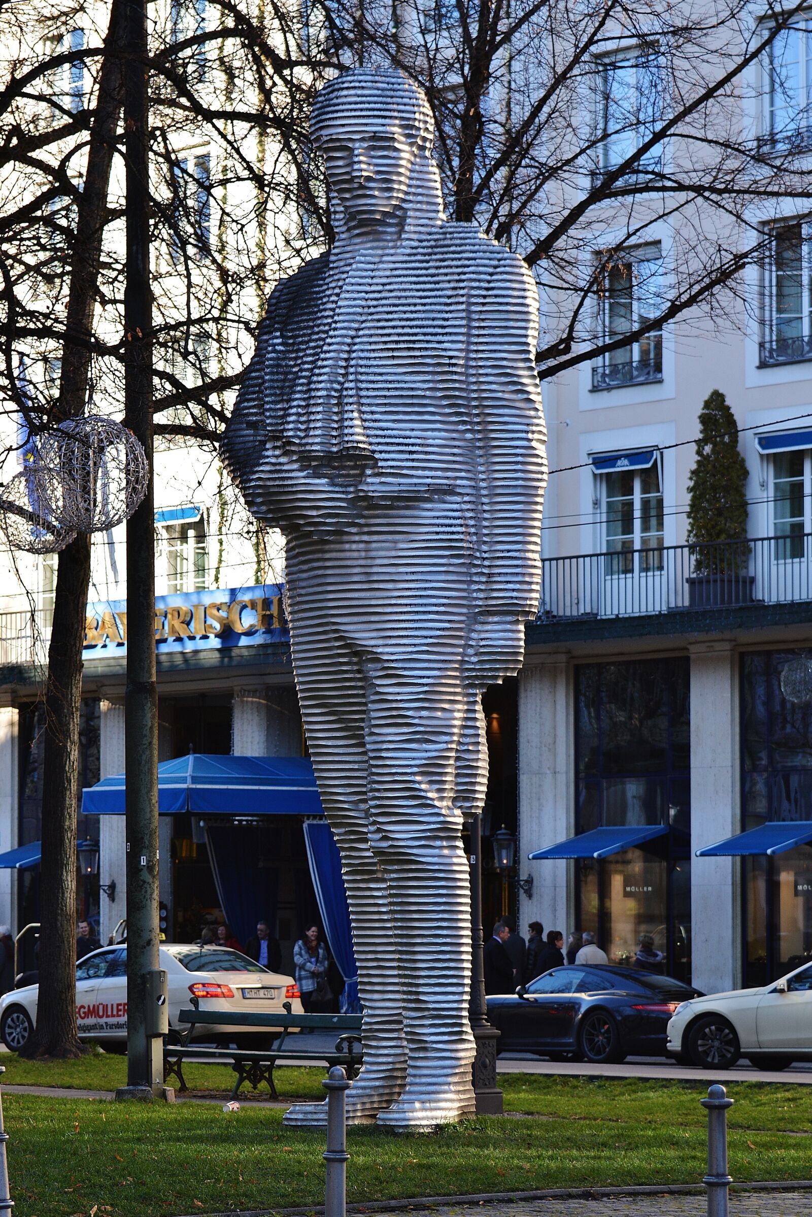 Nikon D3200 sample photo. Promenade place, munich, man photography