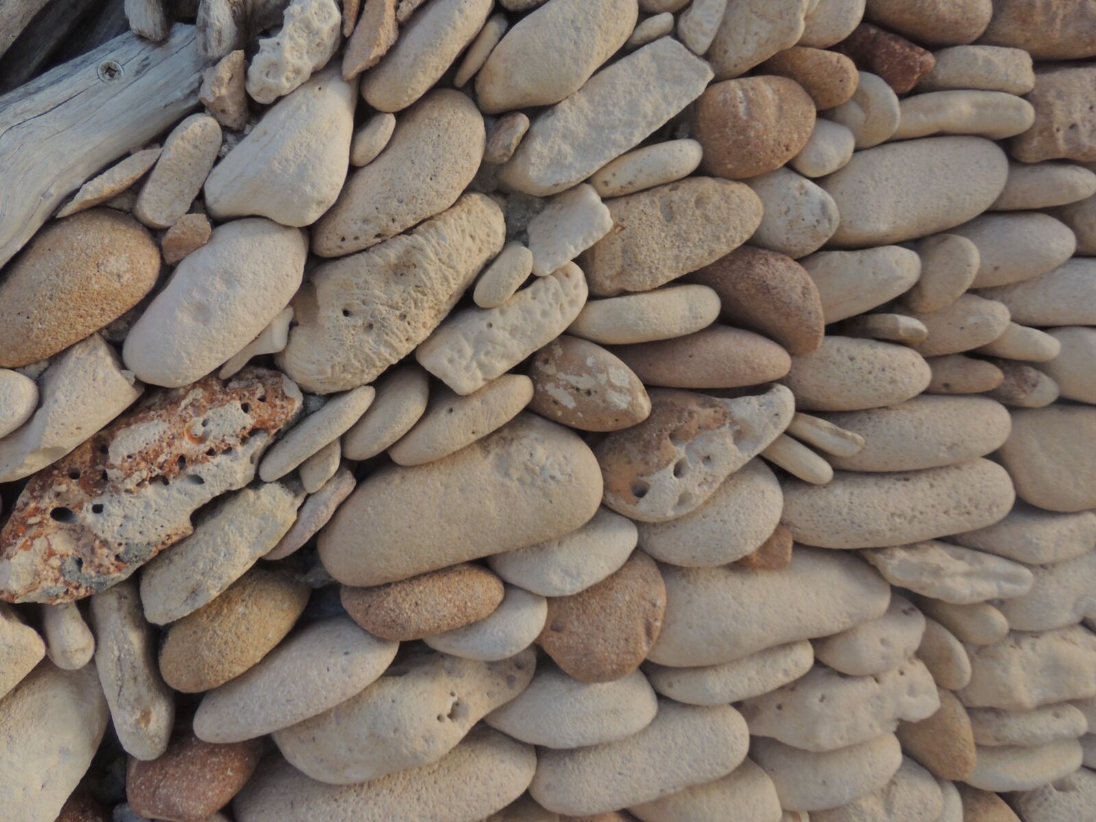 Nikon Coolpix P510 sample photo. Beige, carved, stones, cobblestones photography
