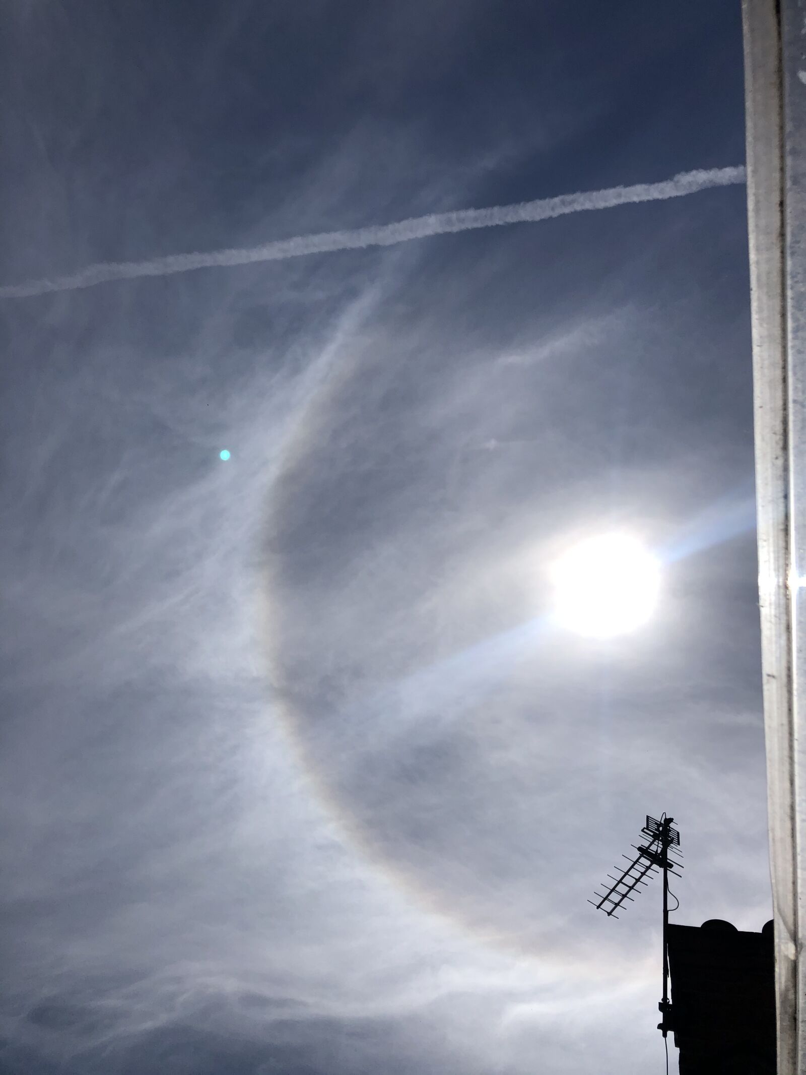 iPhone 8 back camera 3.99mm f/1.8 sample photo. Halo, sky, clouds photography