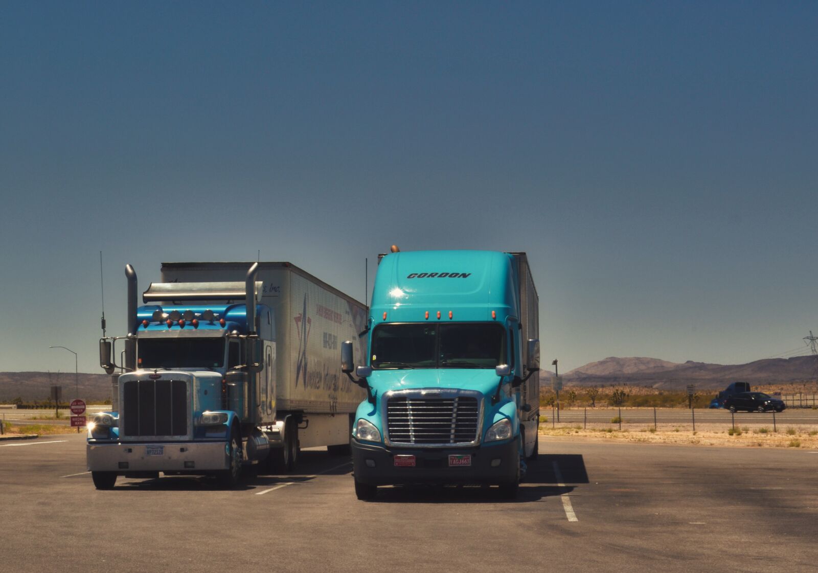 Nikon D3100 sample photo. Trucks, traffic, break photography