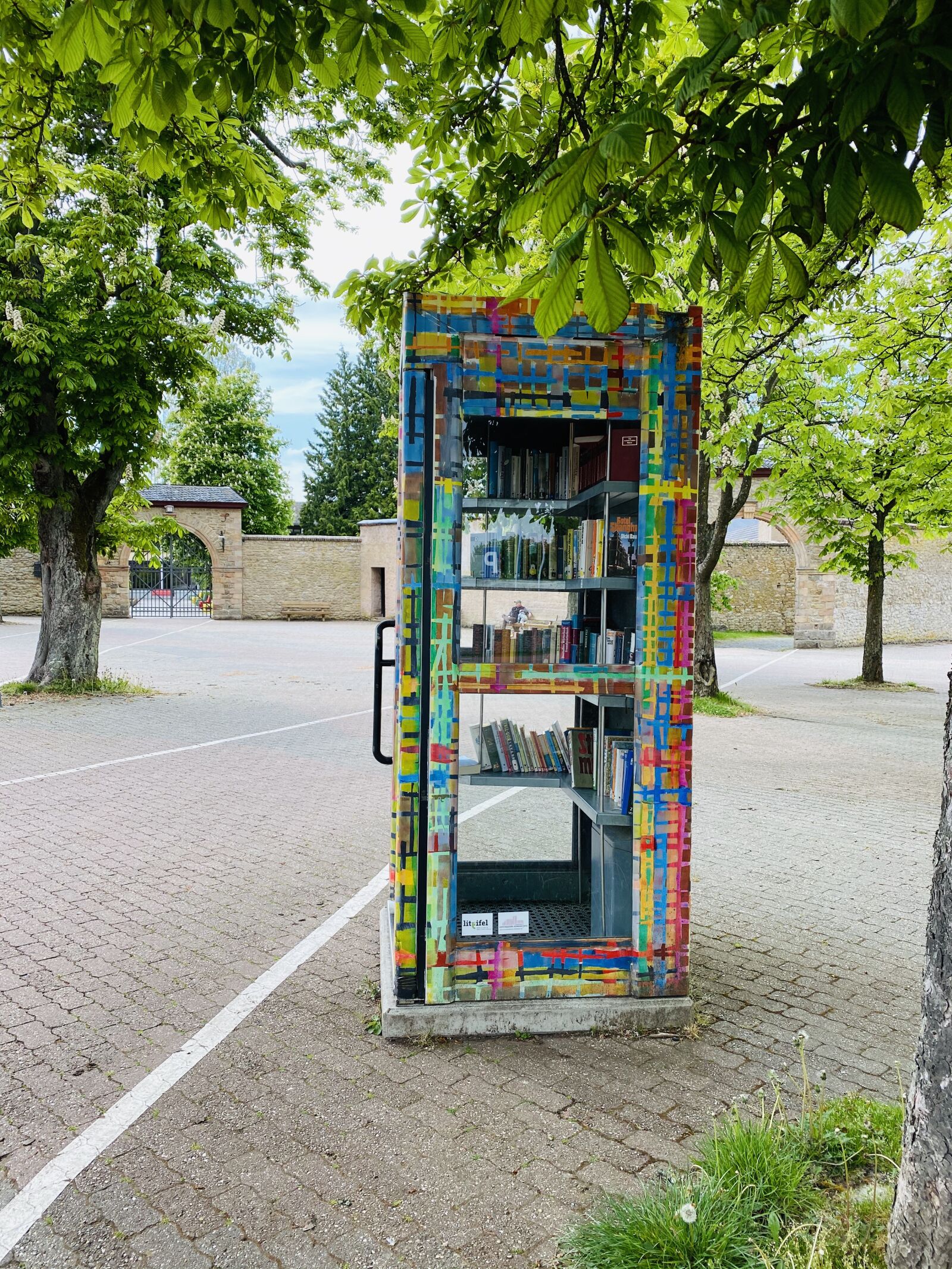 Apple iPhone 11 Pro sample photo. Library, phone booth, read photography