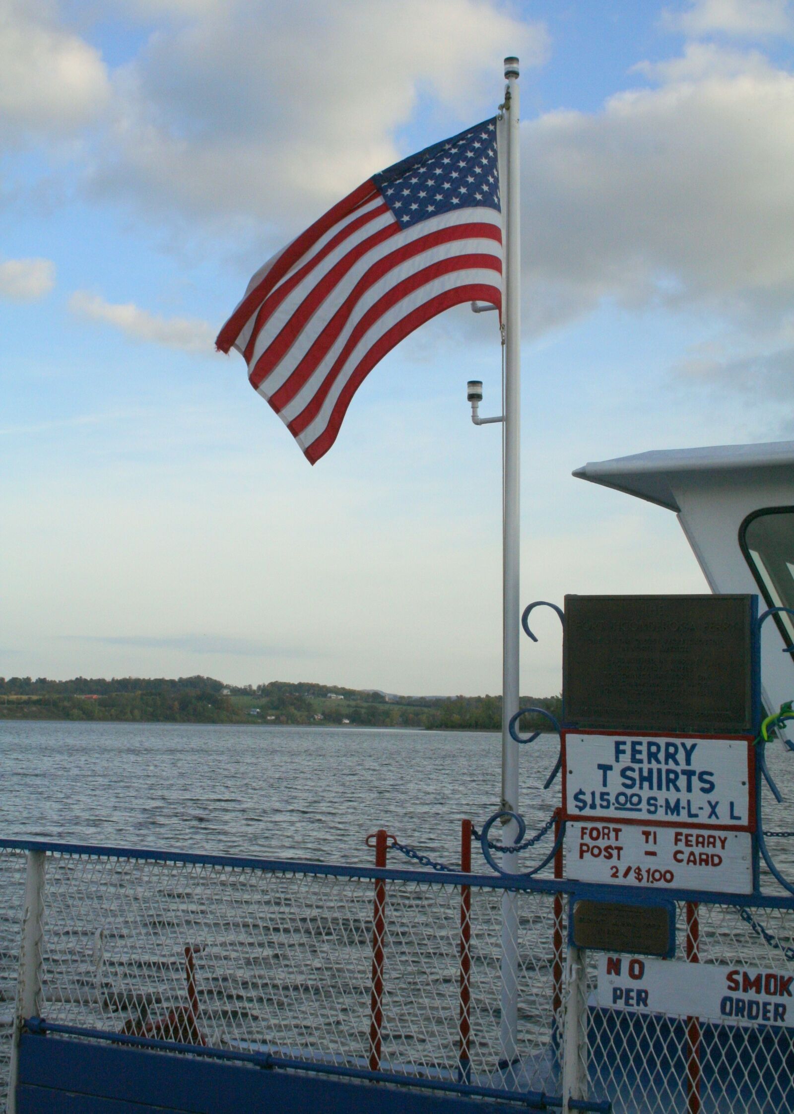 Canon EOS 350D (EOS Digital Rebel XT / EOS Kiss Digital N) sample photo. Ferry, boat, american flag photography