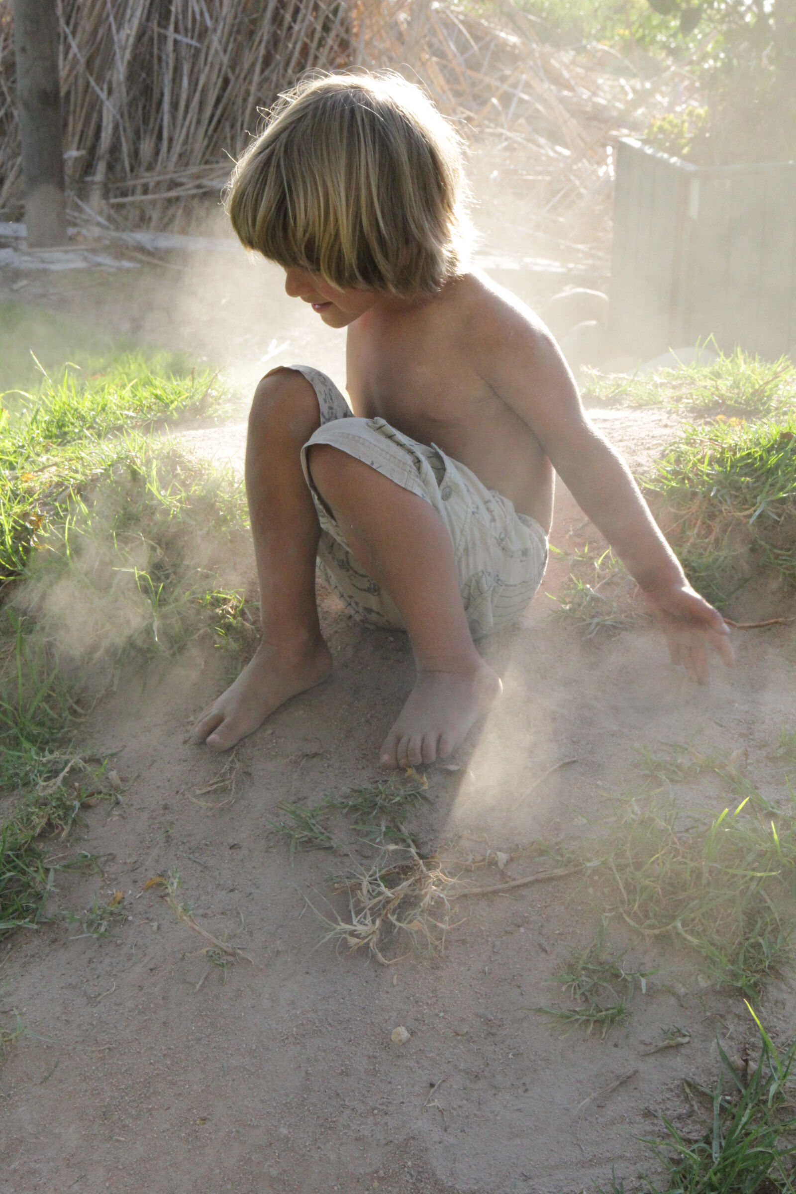 Canon EOS 550D (EOS Rebel T2i / EOS Kiss X4) sample photo. Barefoot, boy, dust, mothernature photography