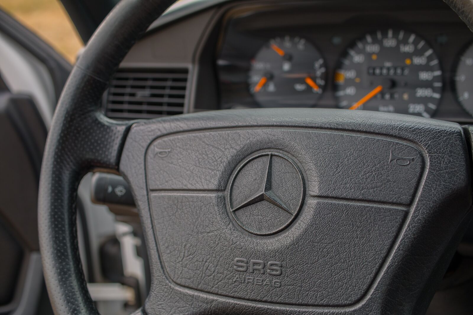 Canon EF-S 35mm F2.8 Macro IS STM sample photo. Mercedes benz, speedo, steering photography