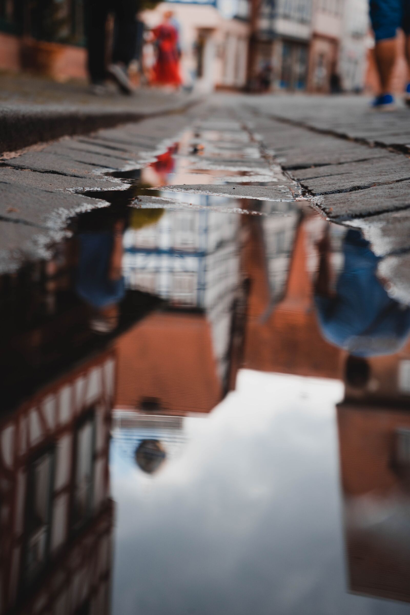 Sony FE 28-70mm F3.5-5.6 OSS sample photo. Puddle, buildings, reflection photography