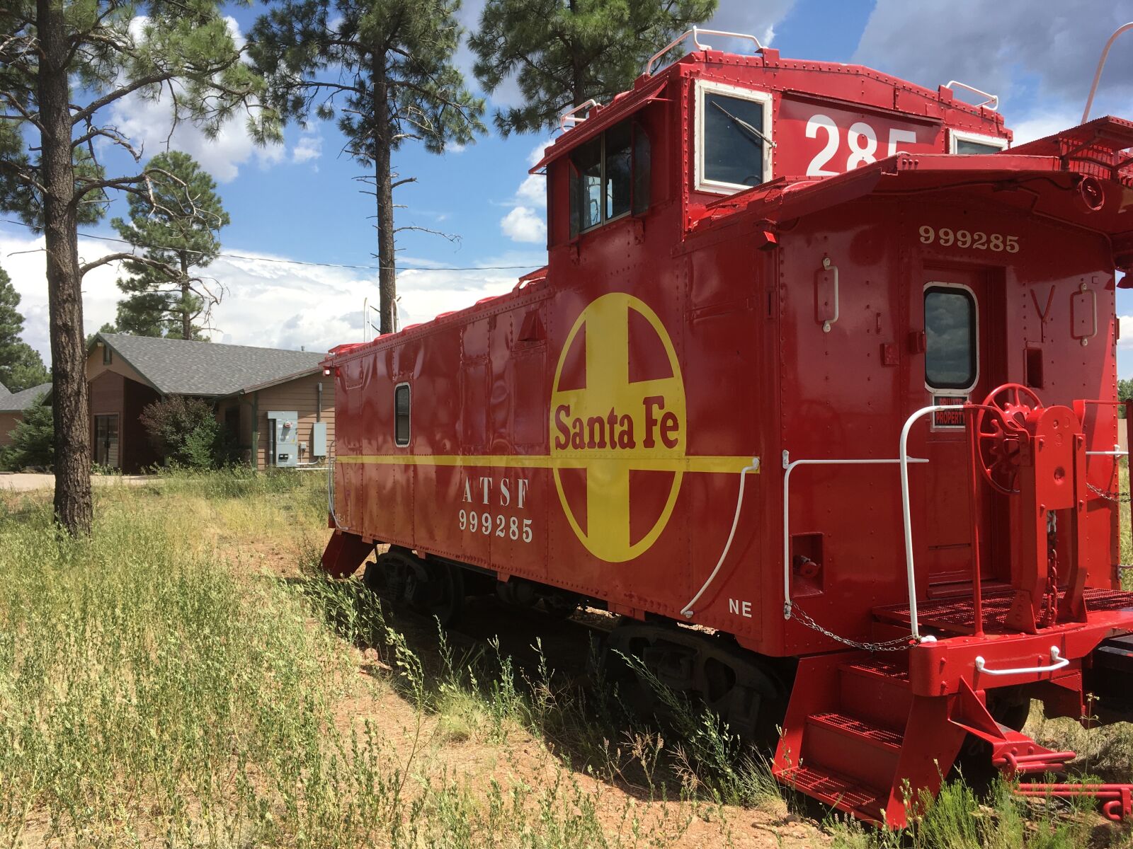 Apple iPhone SE sample photo. Red caboose, trains, transport photography