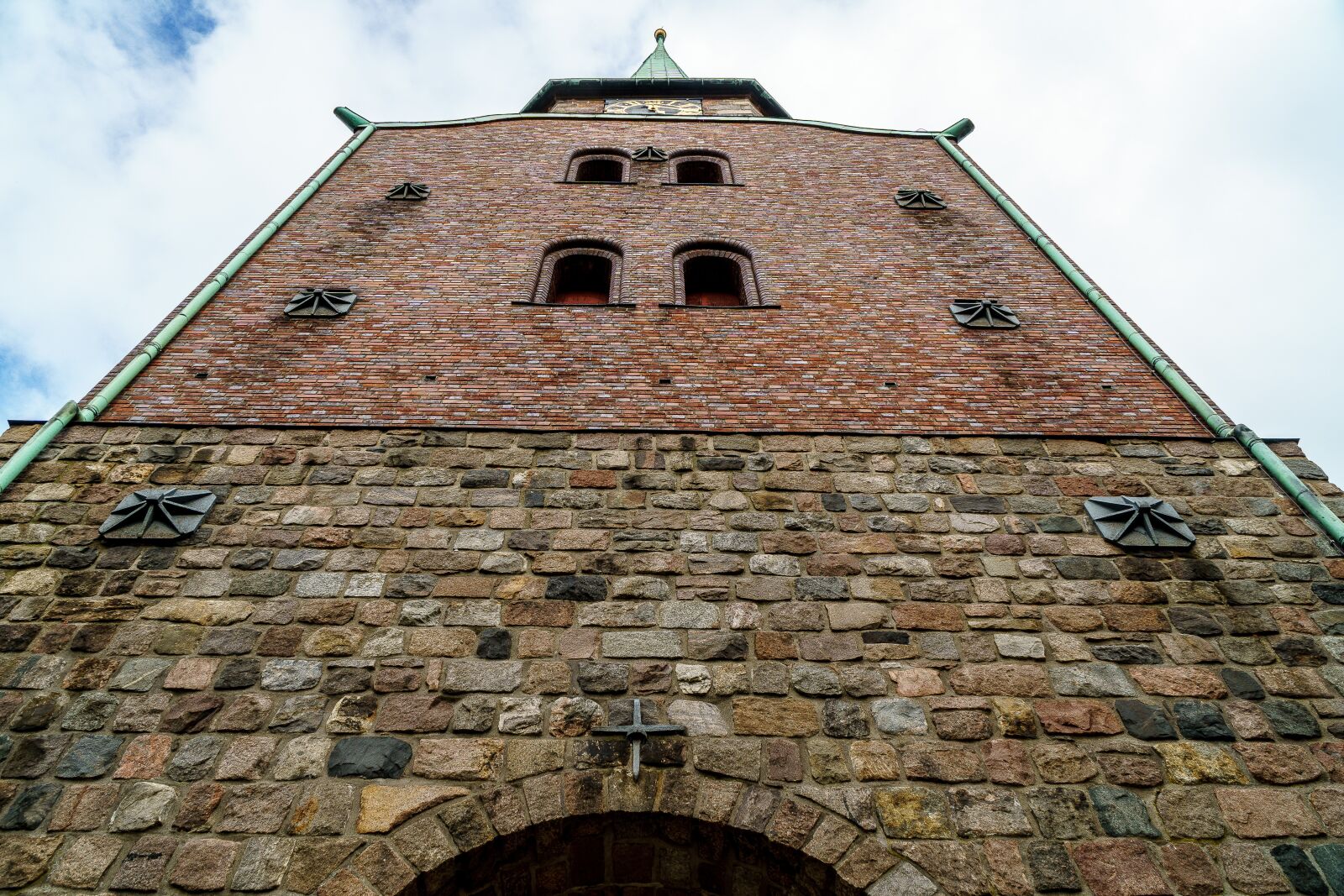Sony a6000 + Sony E PZ 18-105mm F4 G OSS sample photo. Travemünde, church, tower photography