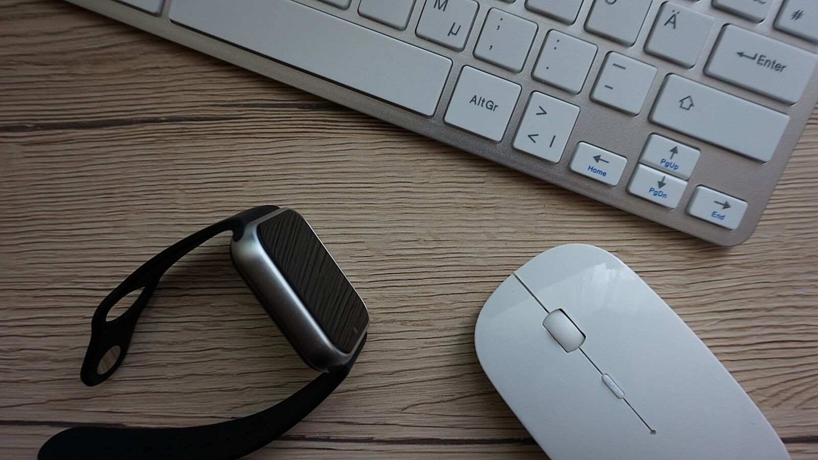 Sony Alpha a5000 (ILCE 5000) sample photo. Smart watch, keyboard, mouse photography