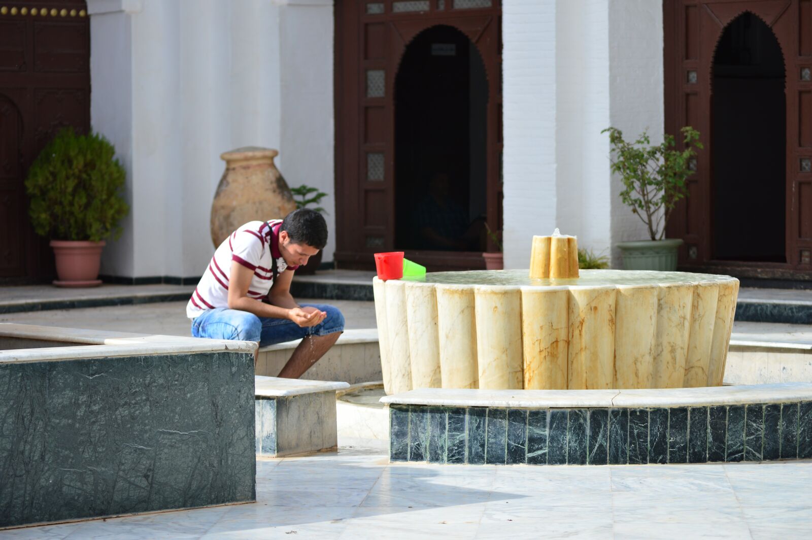 Nikon D3200 sample photo. Men, pray, water photography