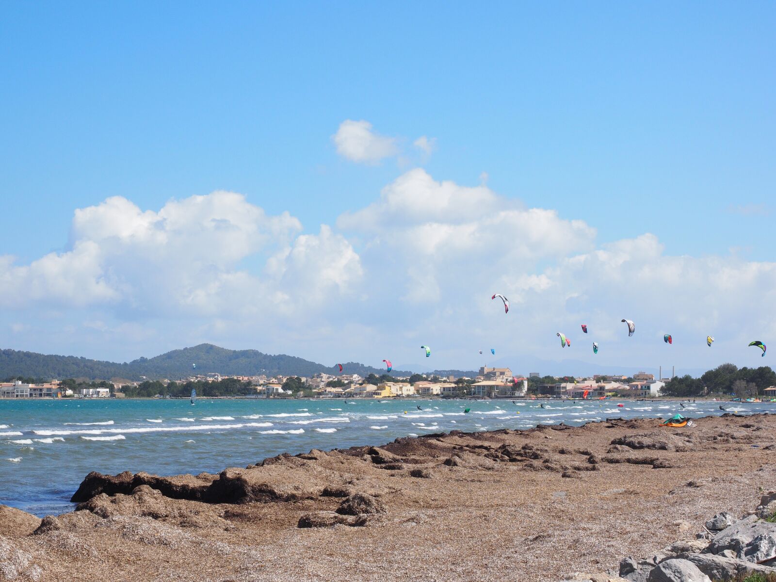 Olympus OM-D E-M1 + Olympus M.Zuiko Digital ED 12-40mm F2.8 Pro sample photo. Kitesurfer, sport, sea photography