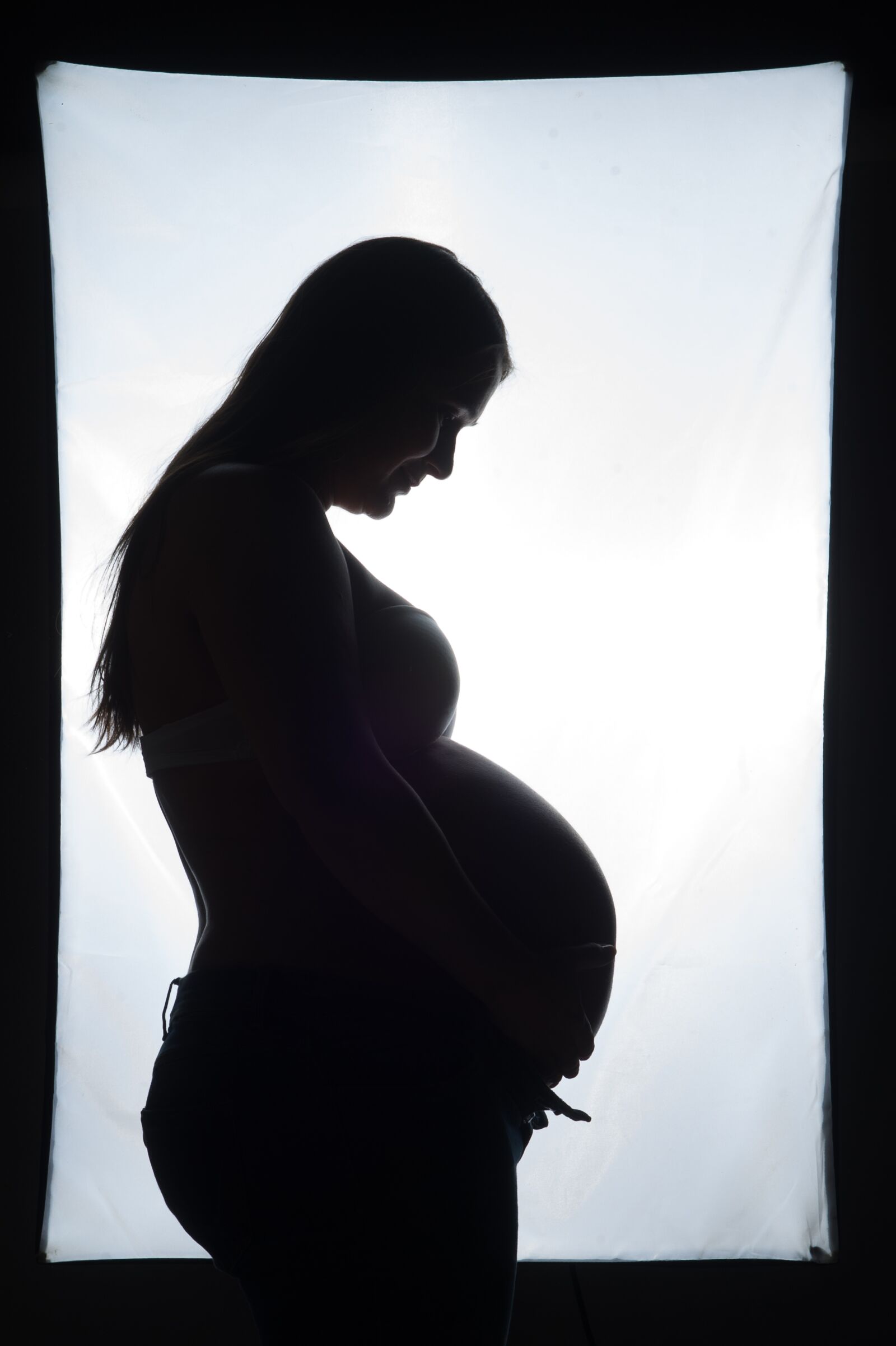 Nikon D3S sample photo. Silhouette, pregnancy, maternity photography