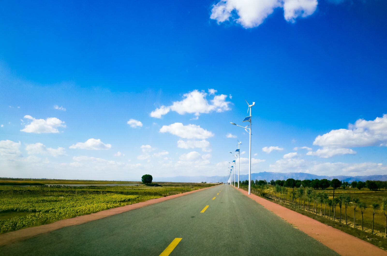 Ricoh GR sample photo. Road, blue sky, landscape photography