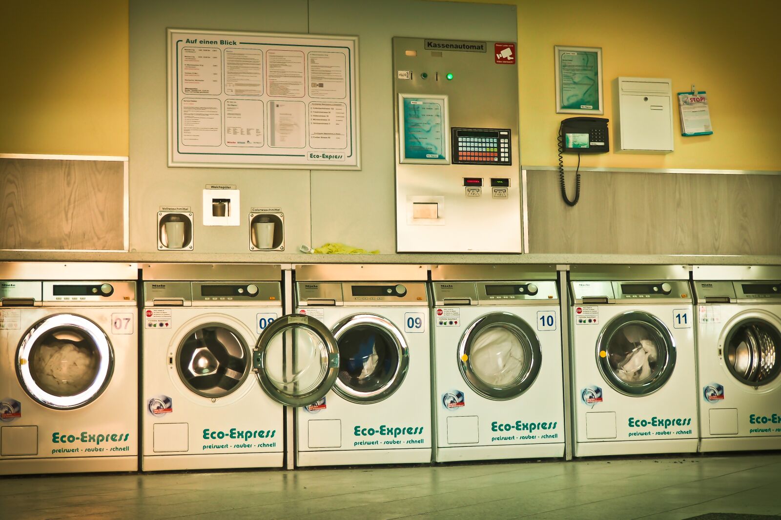 Olympus OM-D E-M10 sample photo. Launderette, washing machines, wash photography
