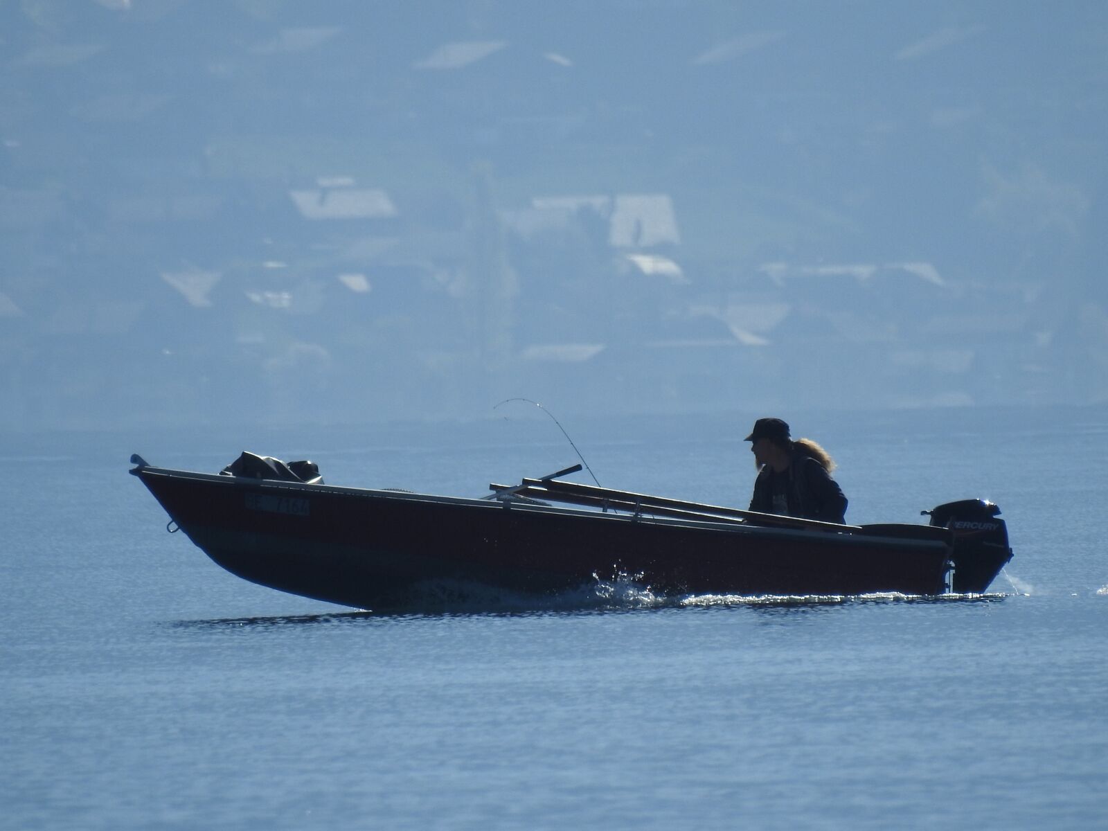 Nikon Coolpix P900 sample photo. Fisherman, lake thun, spring photography