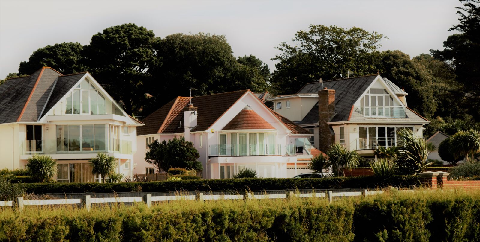 Canon EOS 70D sample photo. Houses, by, trees, against photography