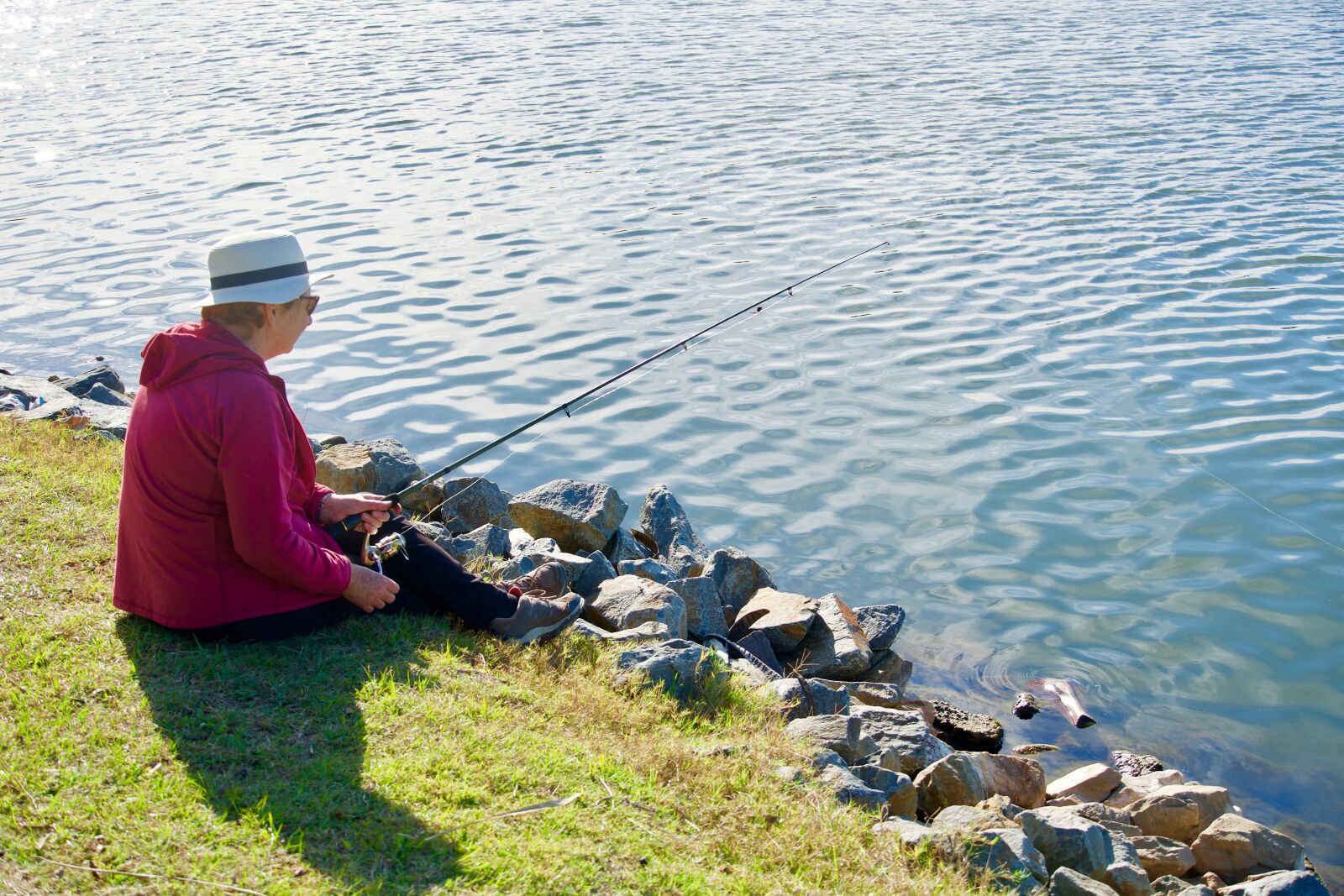 Sony E 18-135mm F3.5-5.6 OSS sample photo. Fisher, fishing, fish photography