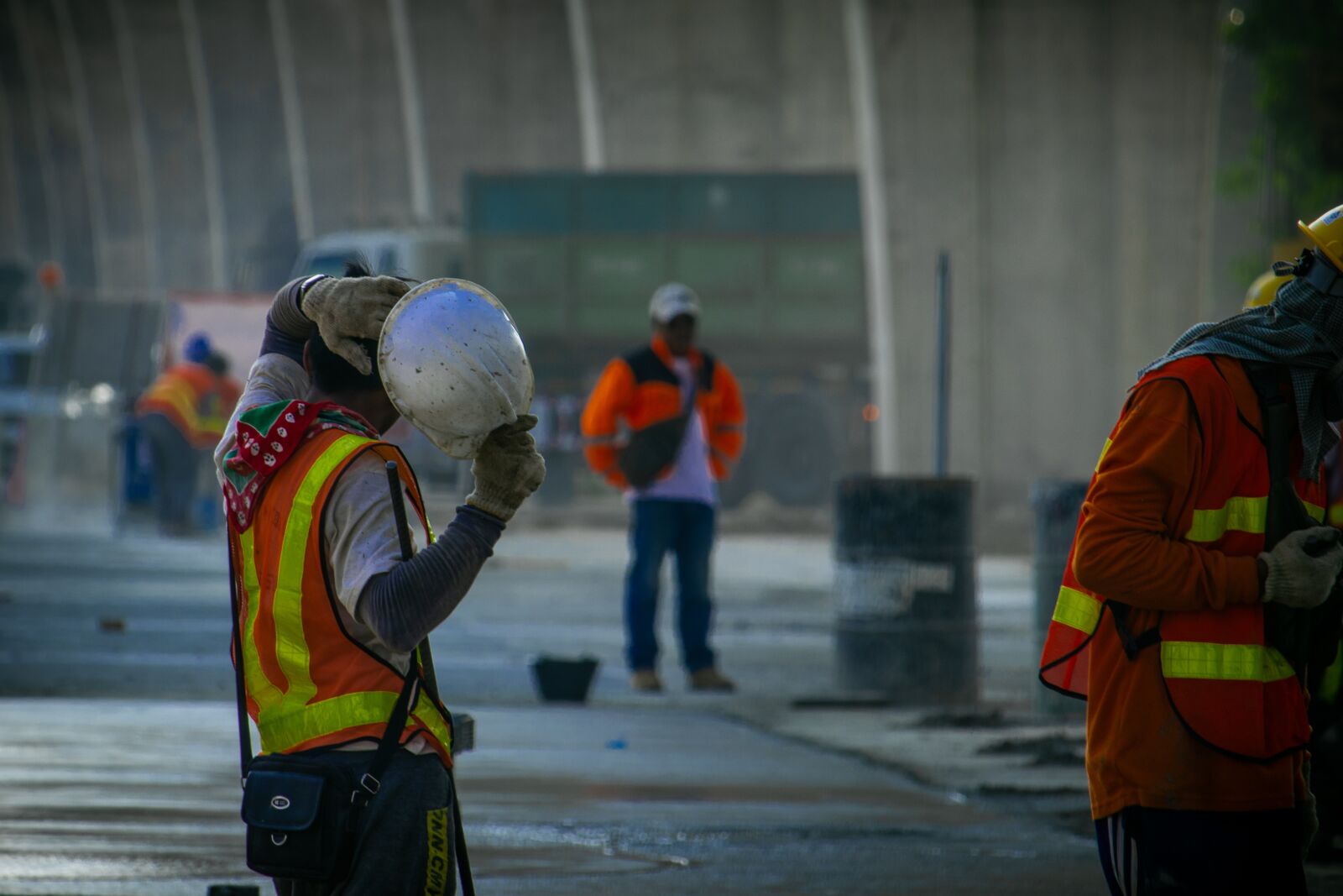 Canon EF-S 55-250mm F4-5.6 IS STM sample photo. Highway road construction, worker photography