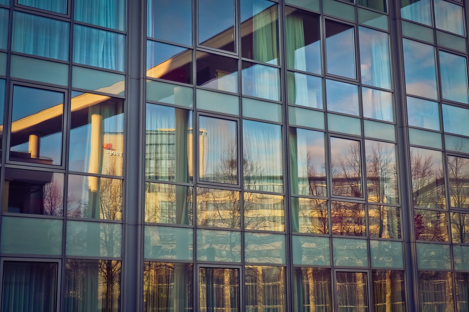 Olympus OM-D E-M10 sample photo. Glass, window, architecture photography