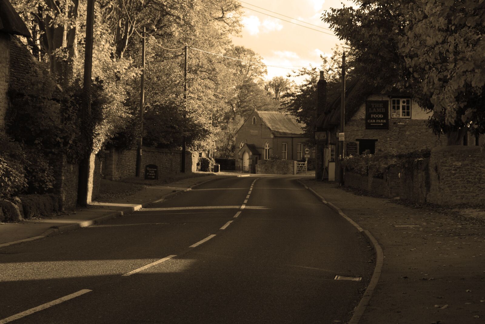 Sony Alpha DSLR-A230 sample photo. Village, street, sepia photography