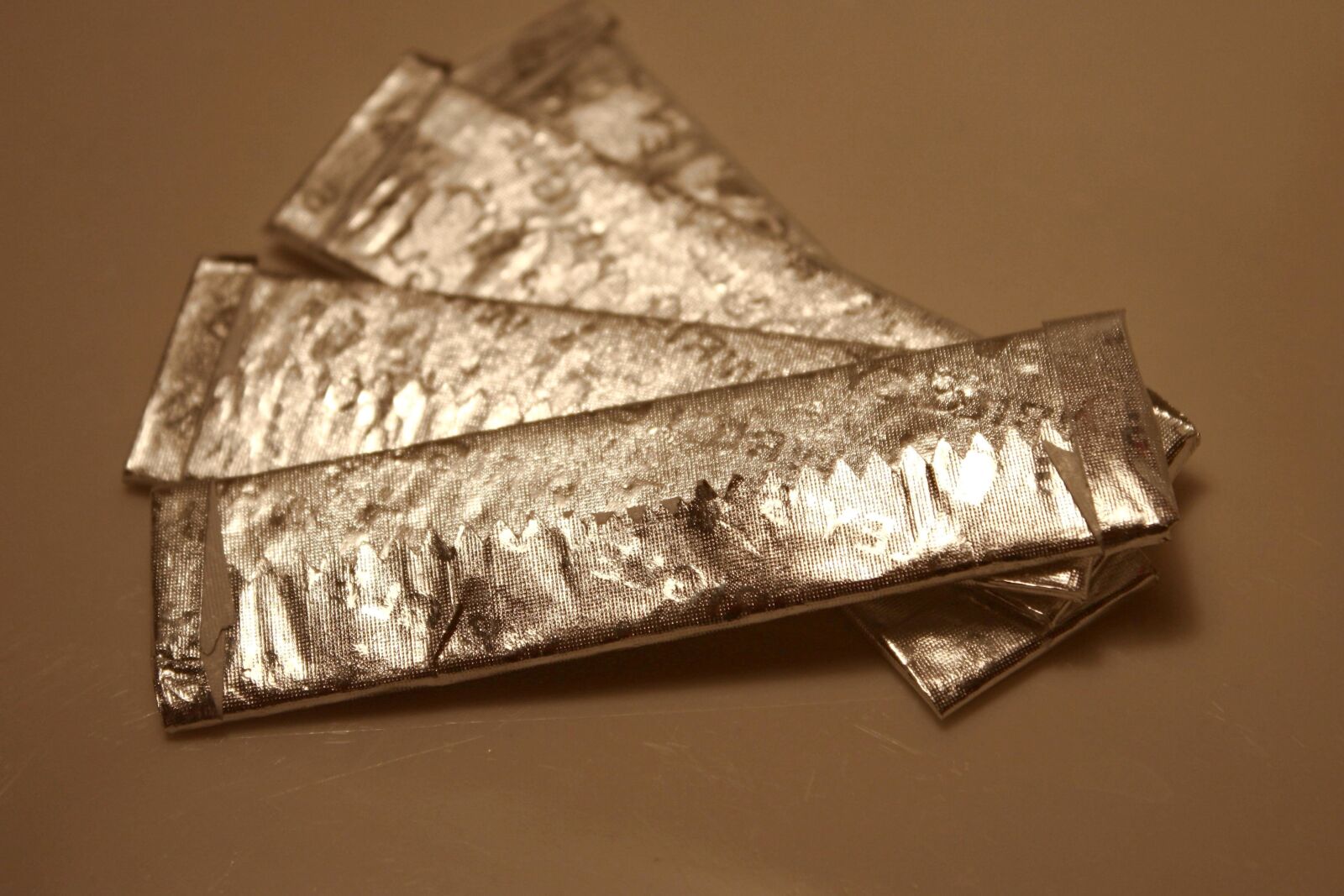 f/3.5-5.6 IS sample photo. Gold, foil, wrapped photography