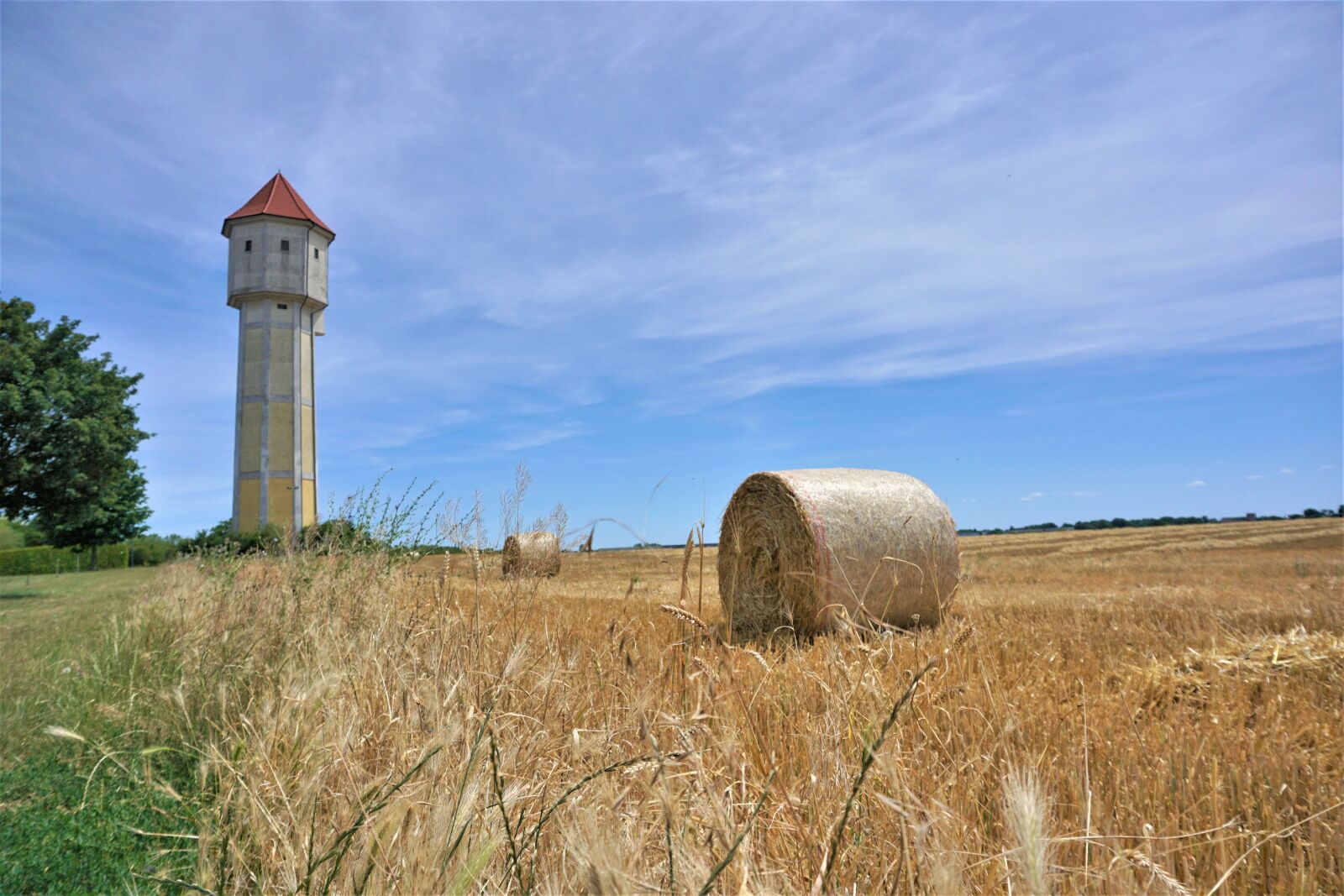 Sony E 16-50mm F3.5-5.6 PZ OSS sample photo. Water tower, blue sky photography
