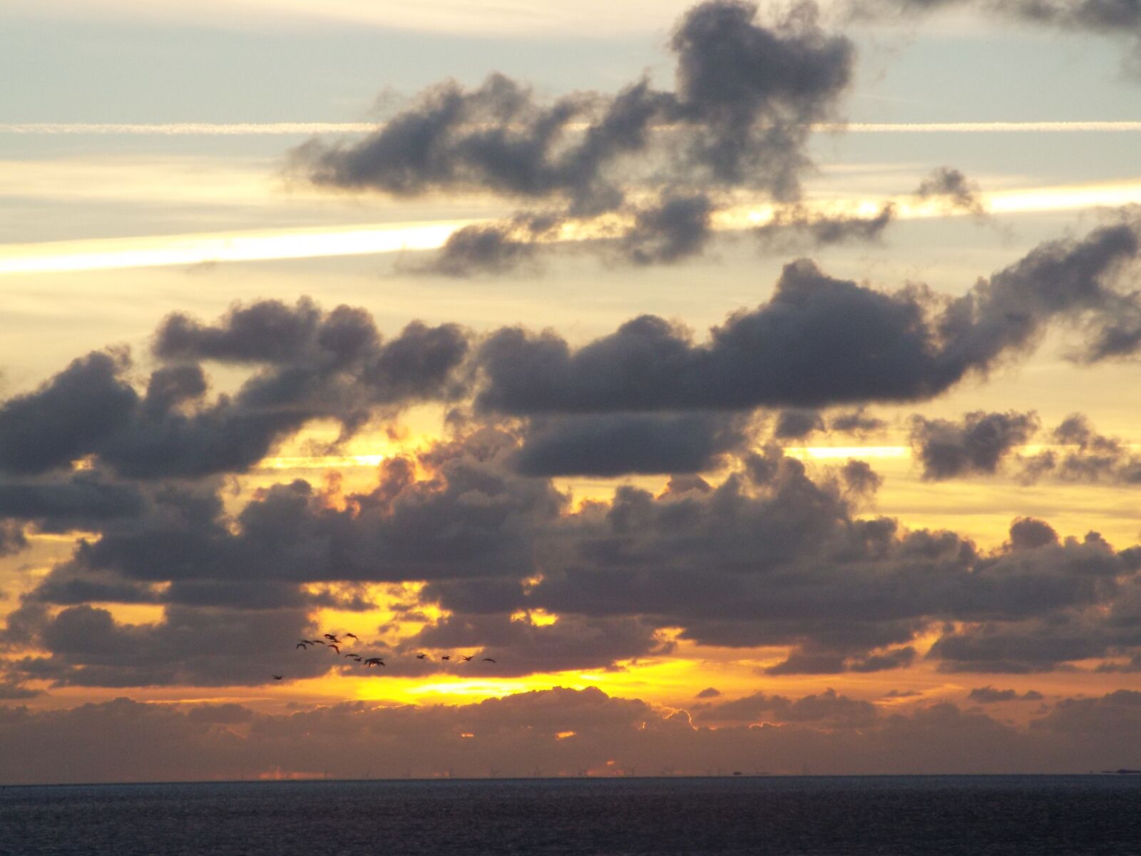 Fujifilm FinePix S9400W sample photo. North sea, clouds, sunset photography